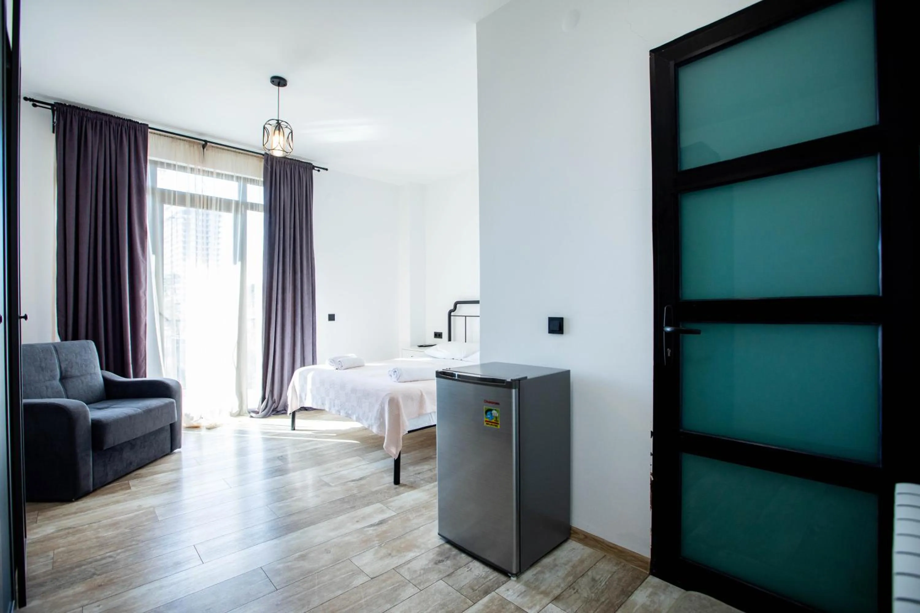 Bedroom in Level Up Hotel & Restaurant