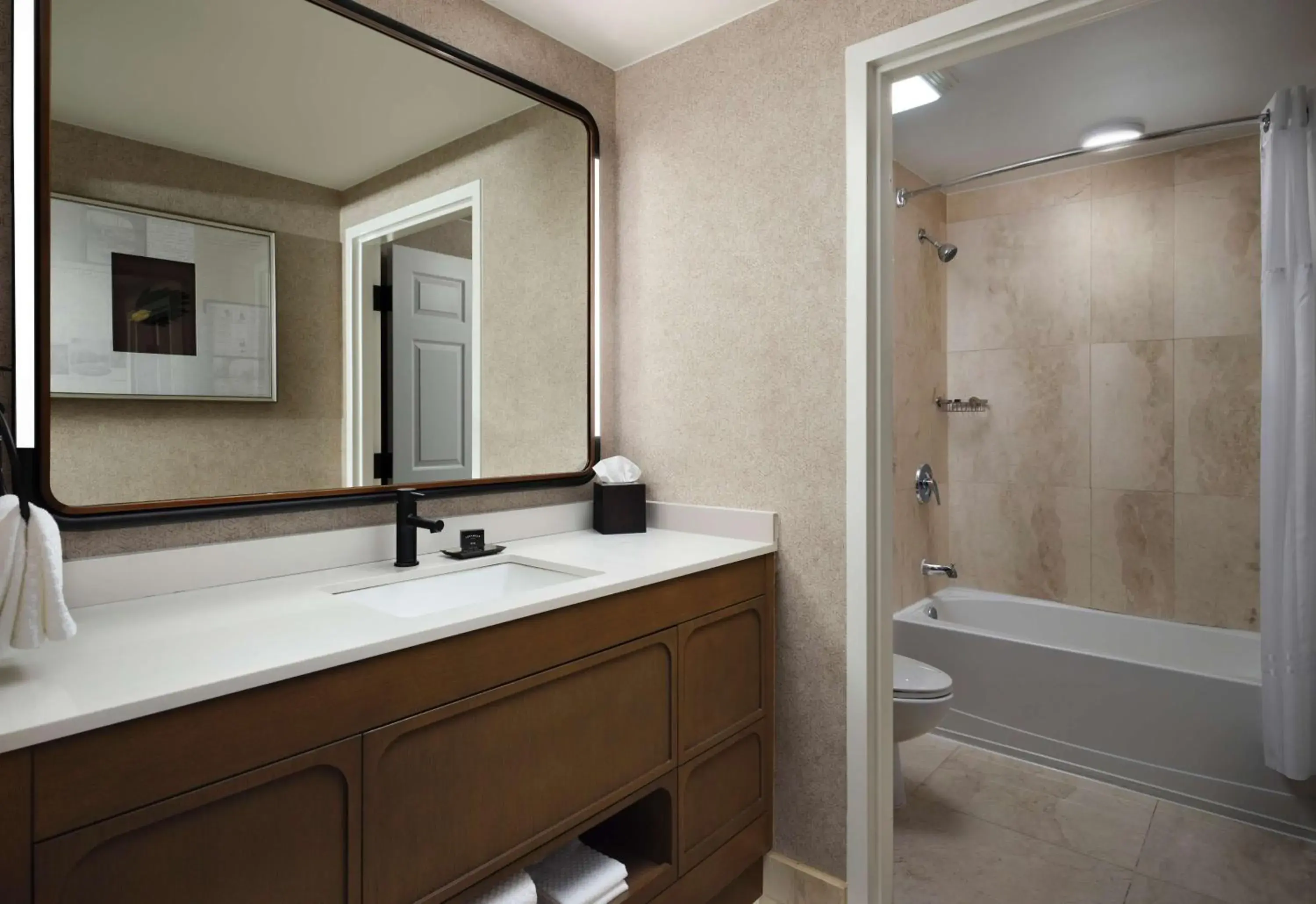 Bathroom in Hotel Flor Tampa Downtown, Tapestry Collection By Hilton Bathroom in Hotel Flor Tampa Downtown, Tapestry Collection By Hilton