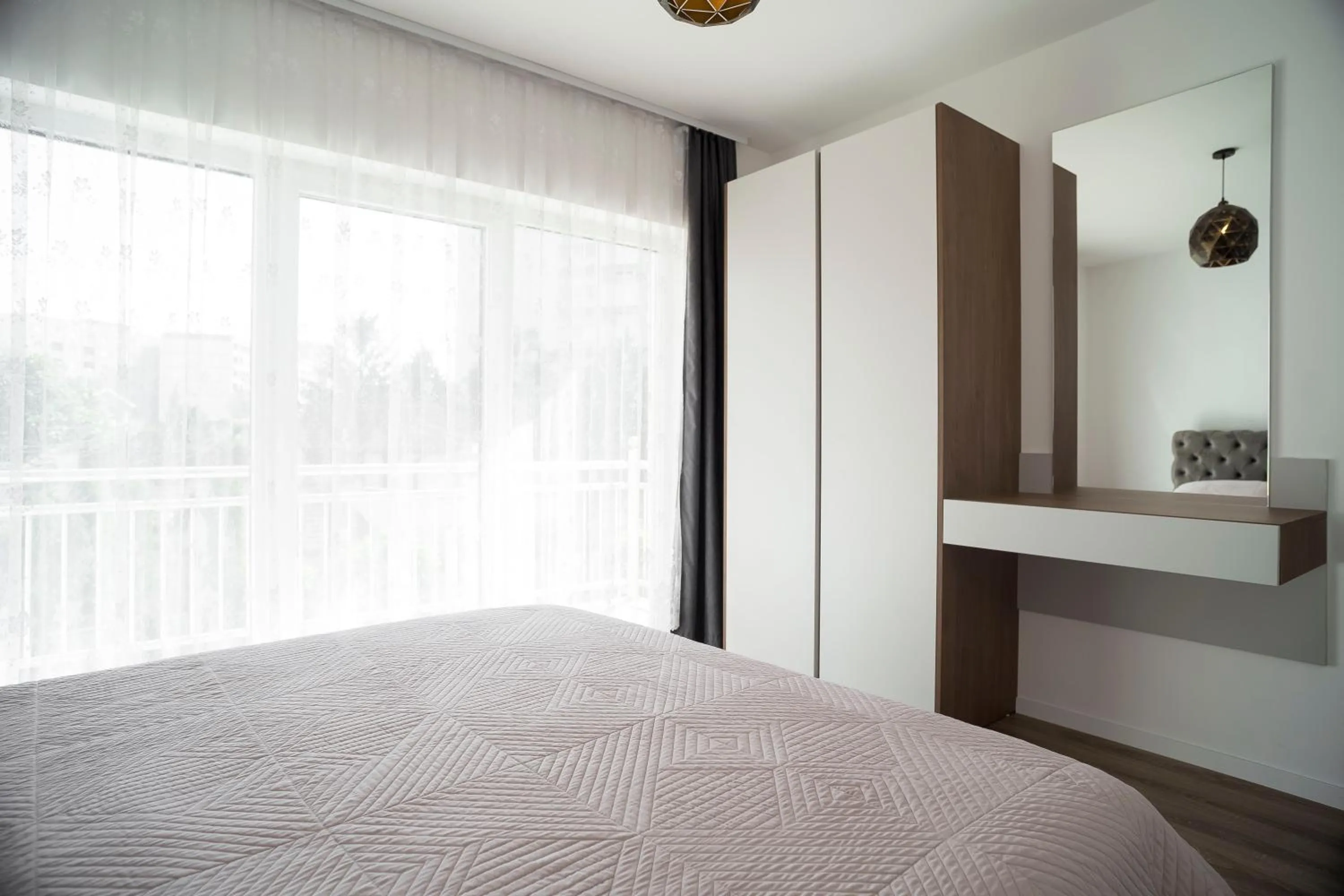 Bed in Lux Apartments