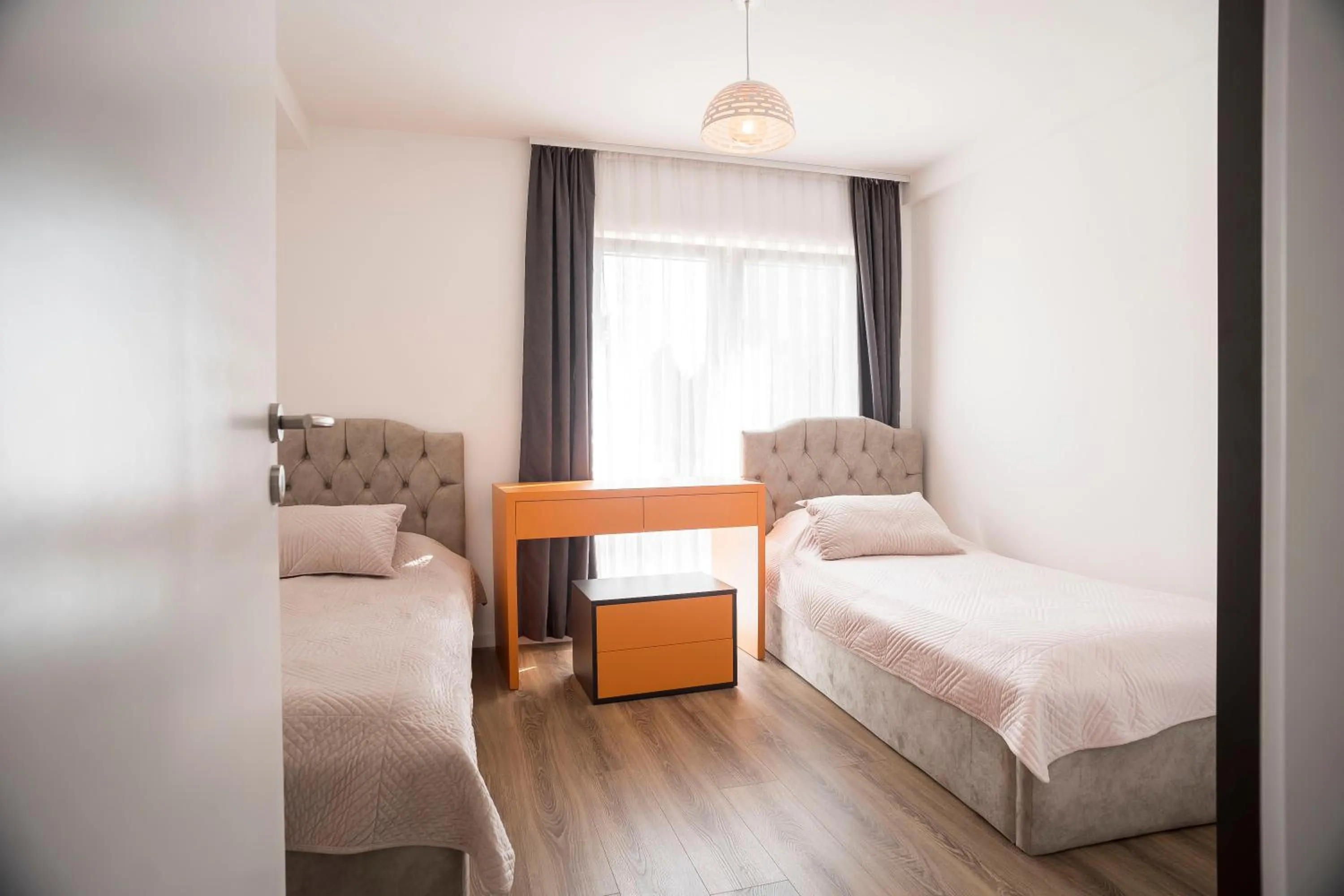 Bed in Lux Apartments