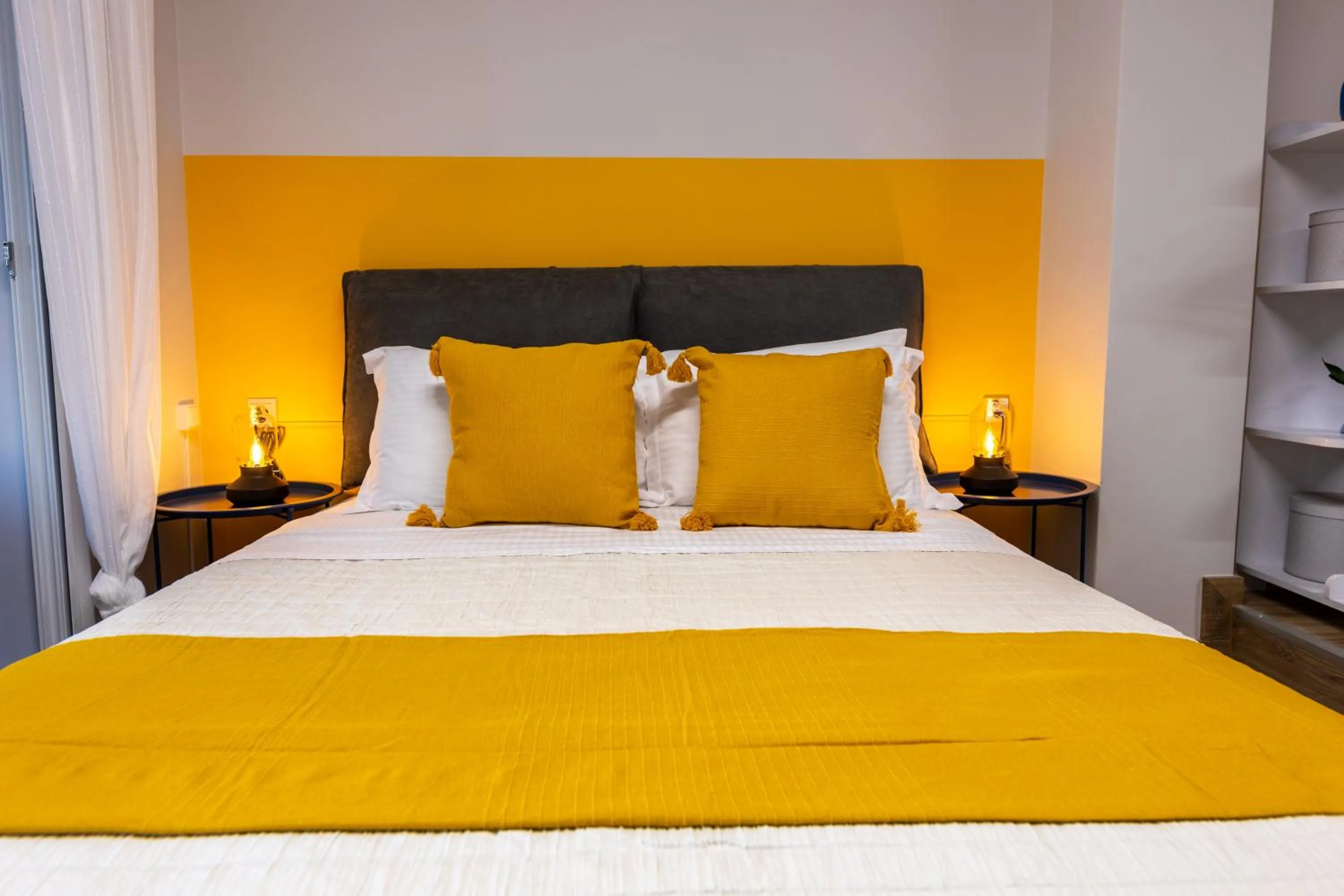Bed in Athenian Sensations Apartments and Suites in the Heart of Athens