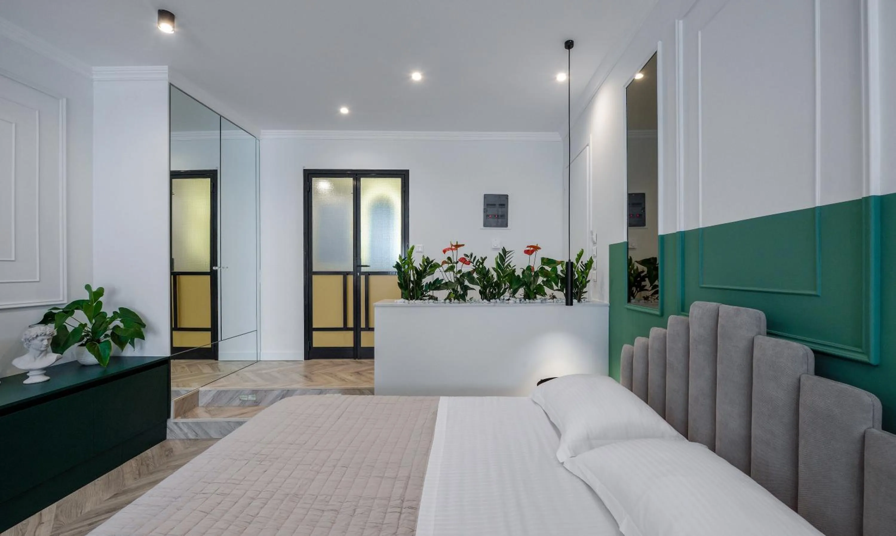 Bed in Athenian Sensations Apartments and Suites in the Heart of Athens