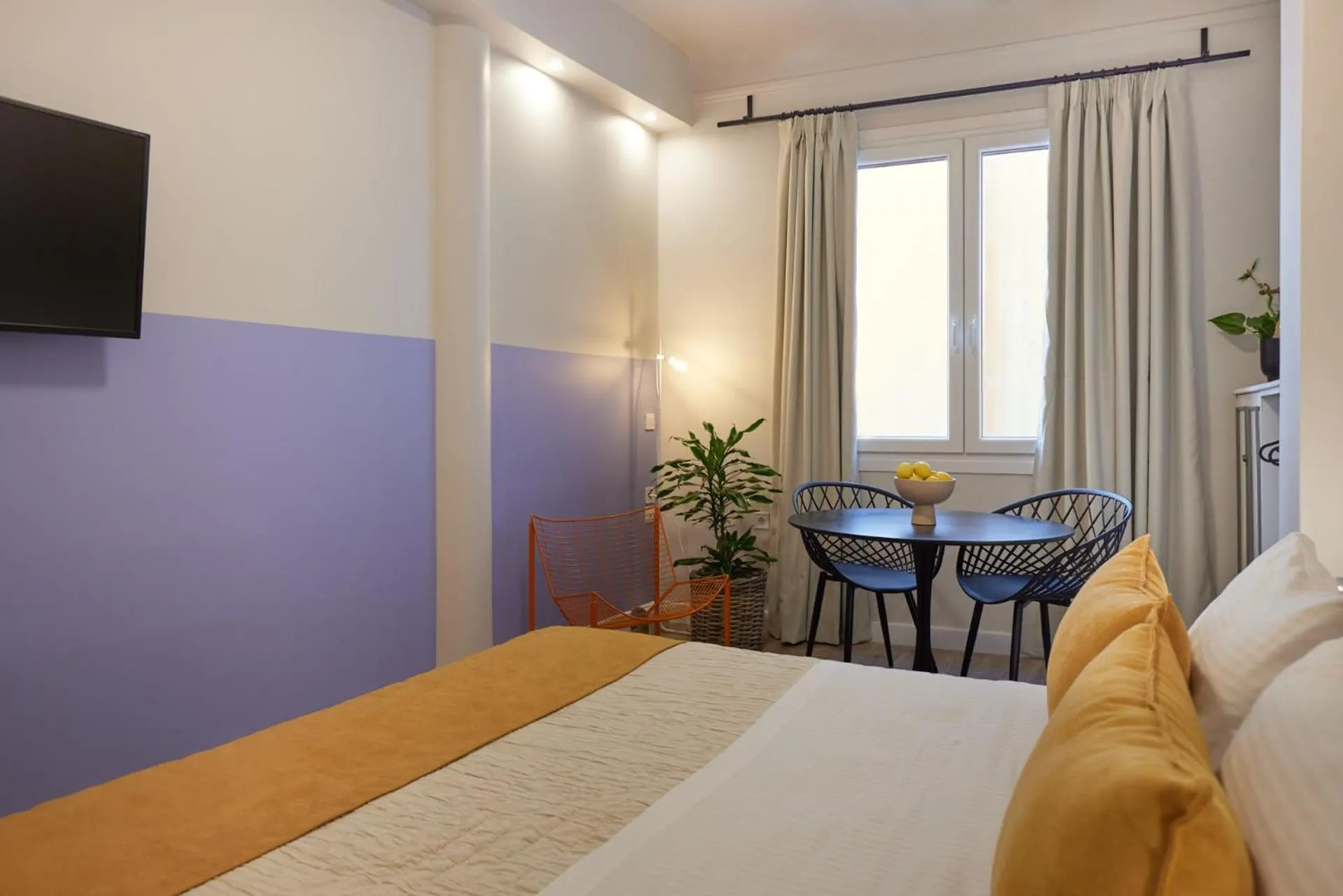 Bed in Athenian Sensations Apartments and Suites in the Heart of Athens