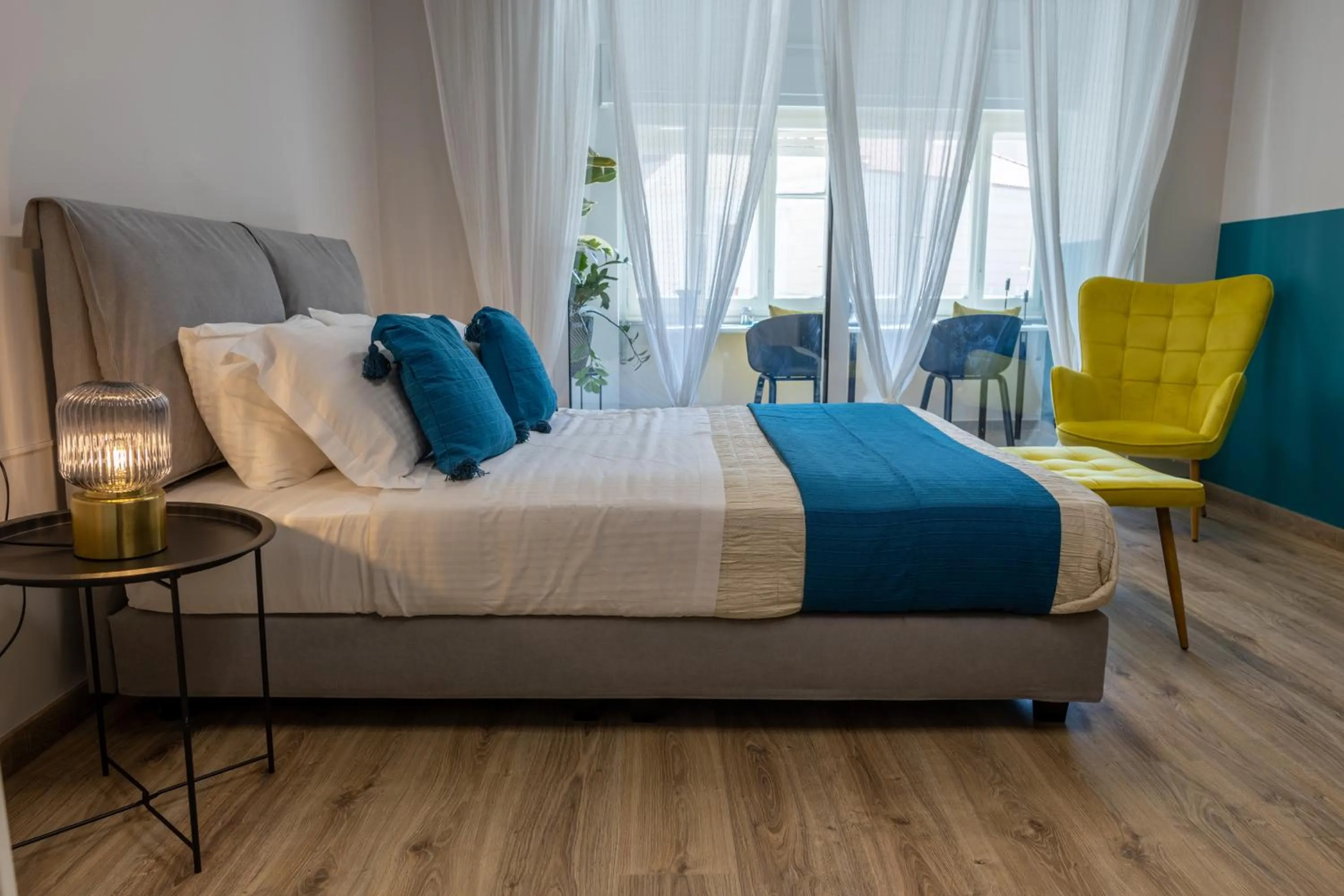 Bed in Athenian Sensations Apartments and Suites in the Heart of Athens