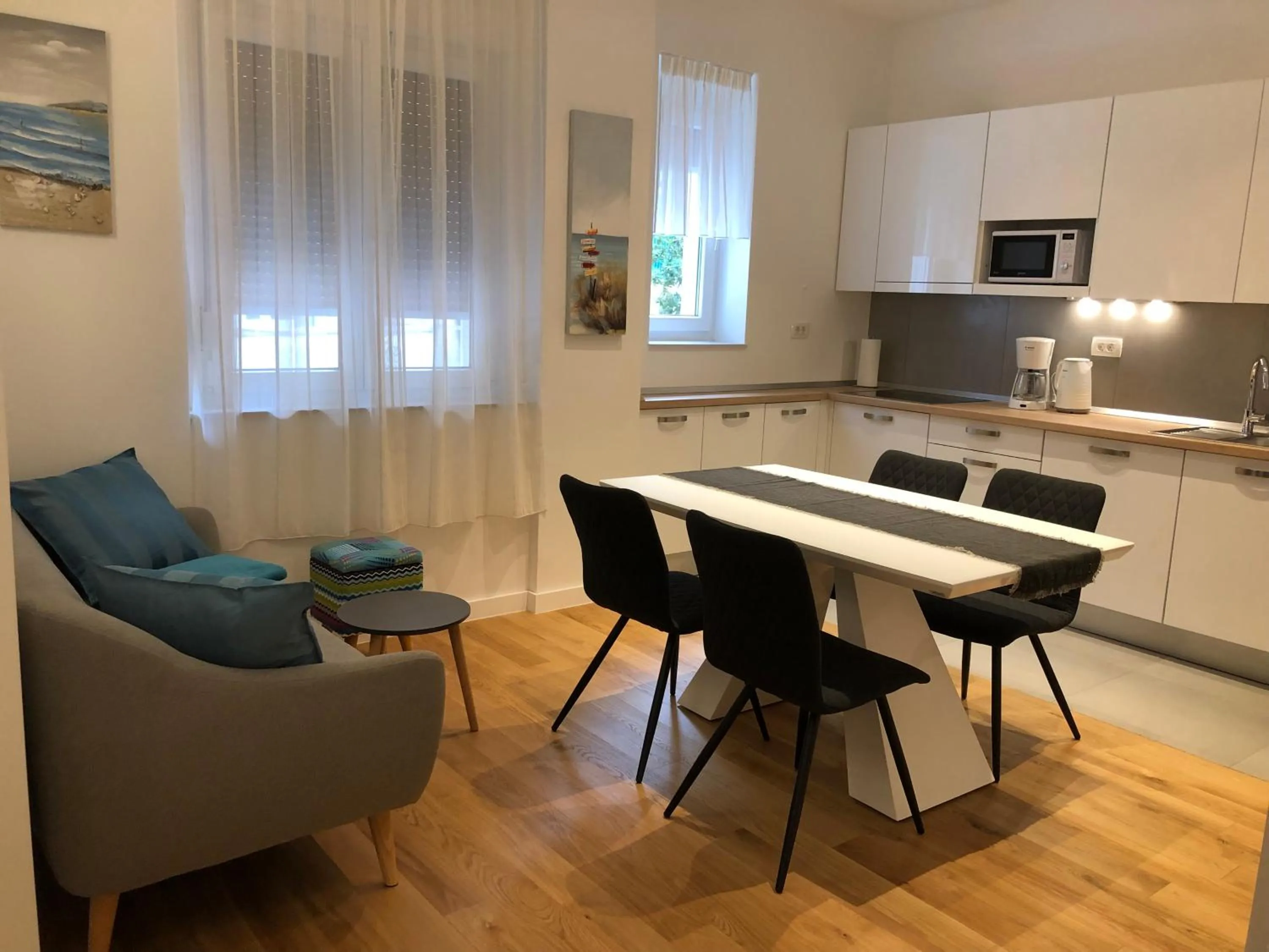 Kitchen or kitchenette in Tempus Apartment