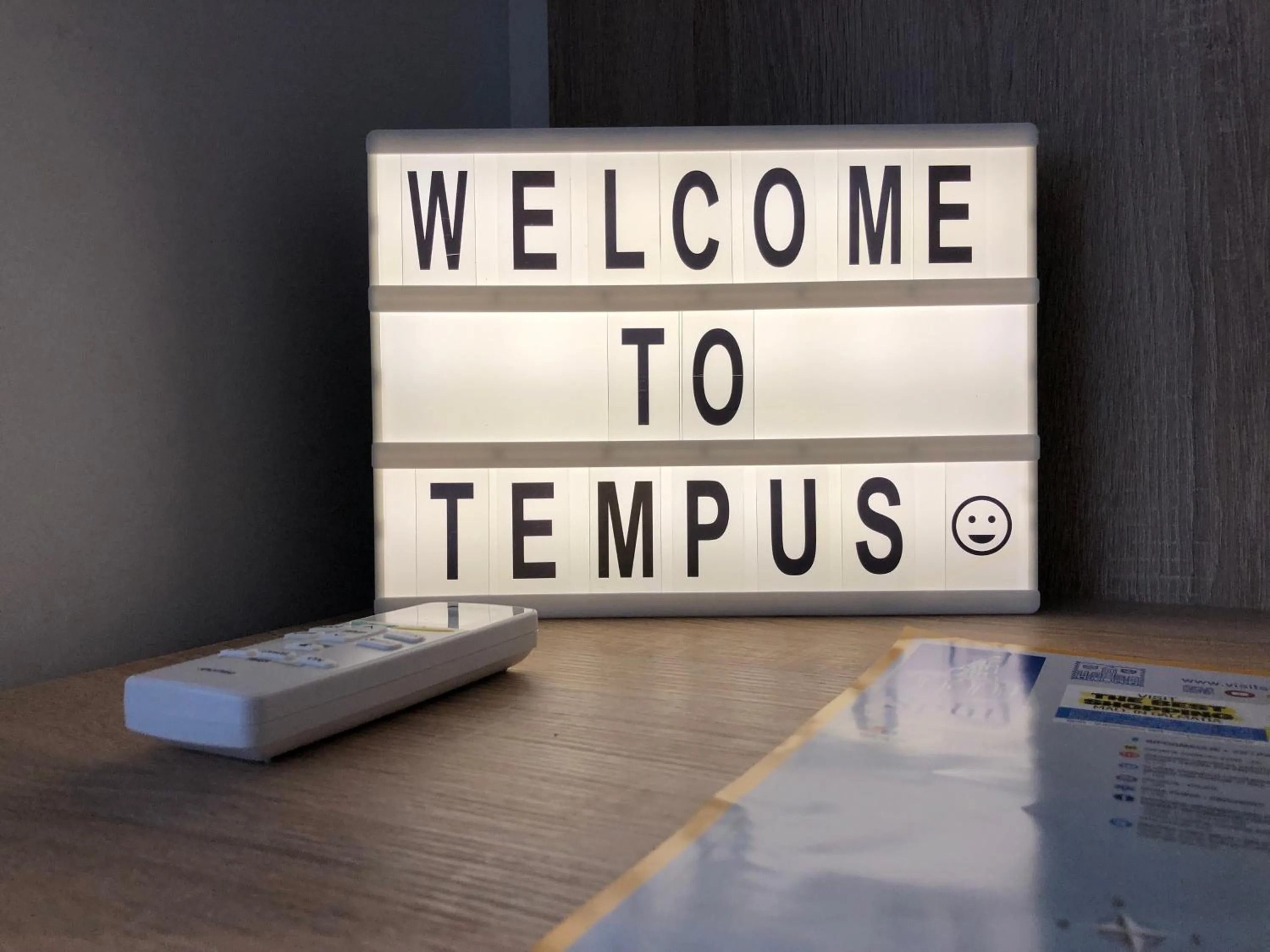 Property logo or sign in Tempus Apartment