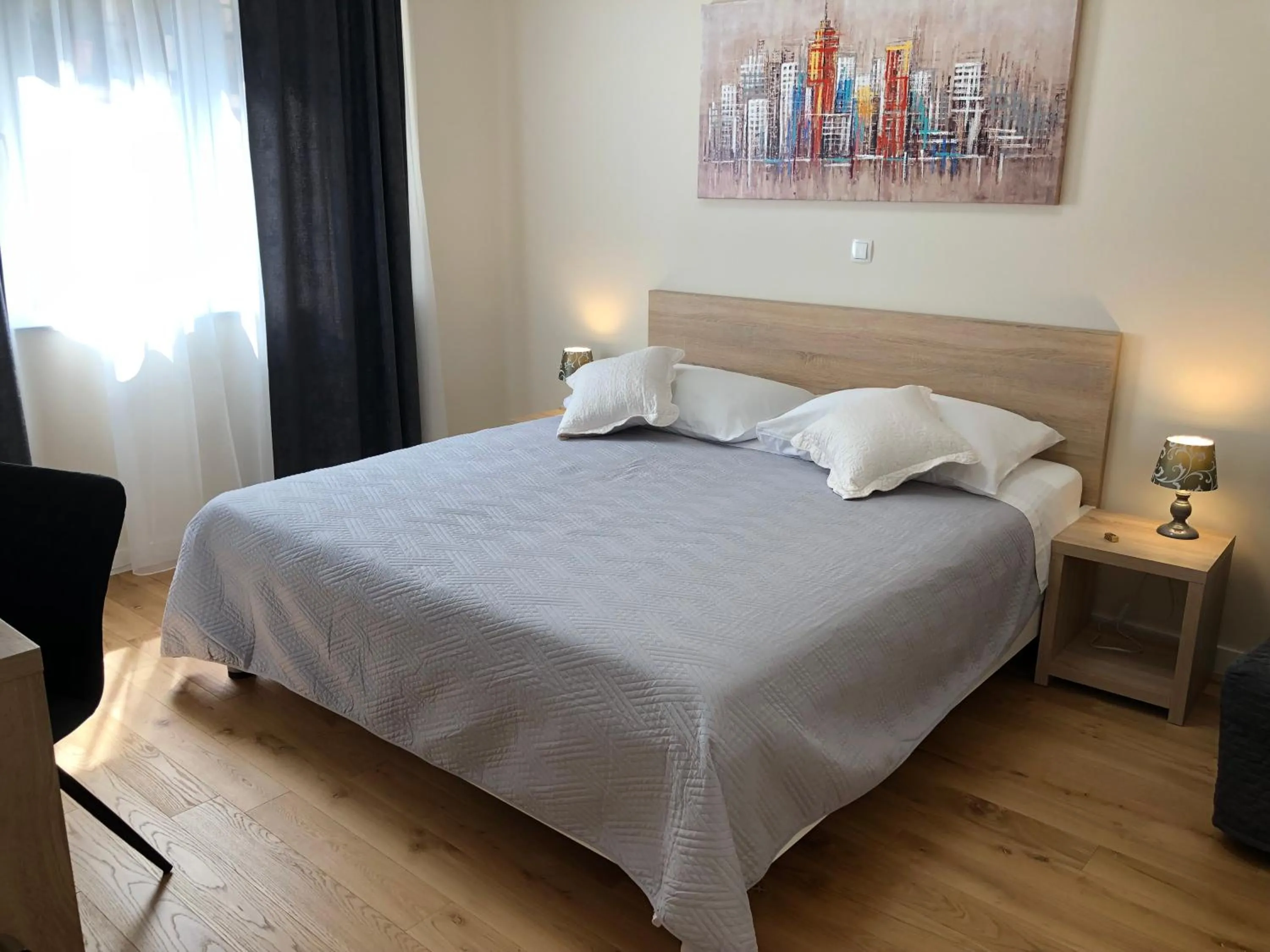 Bed in Tempus Apartment