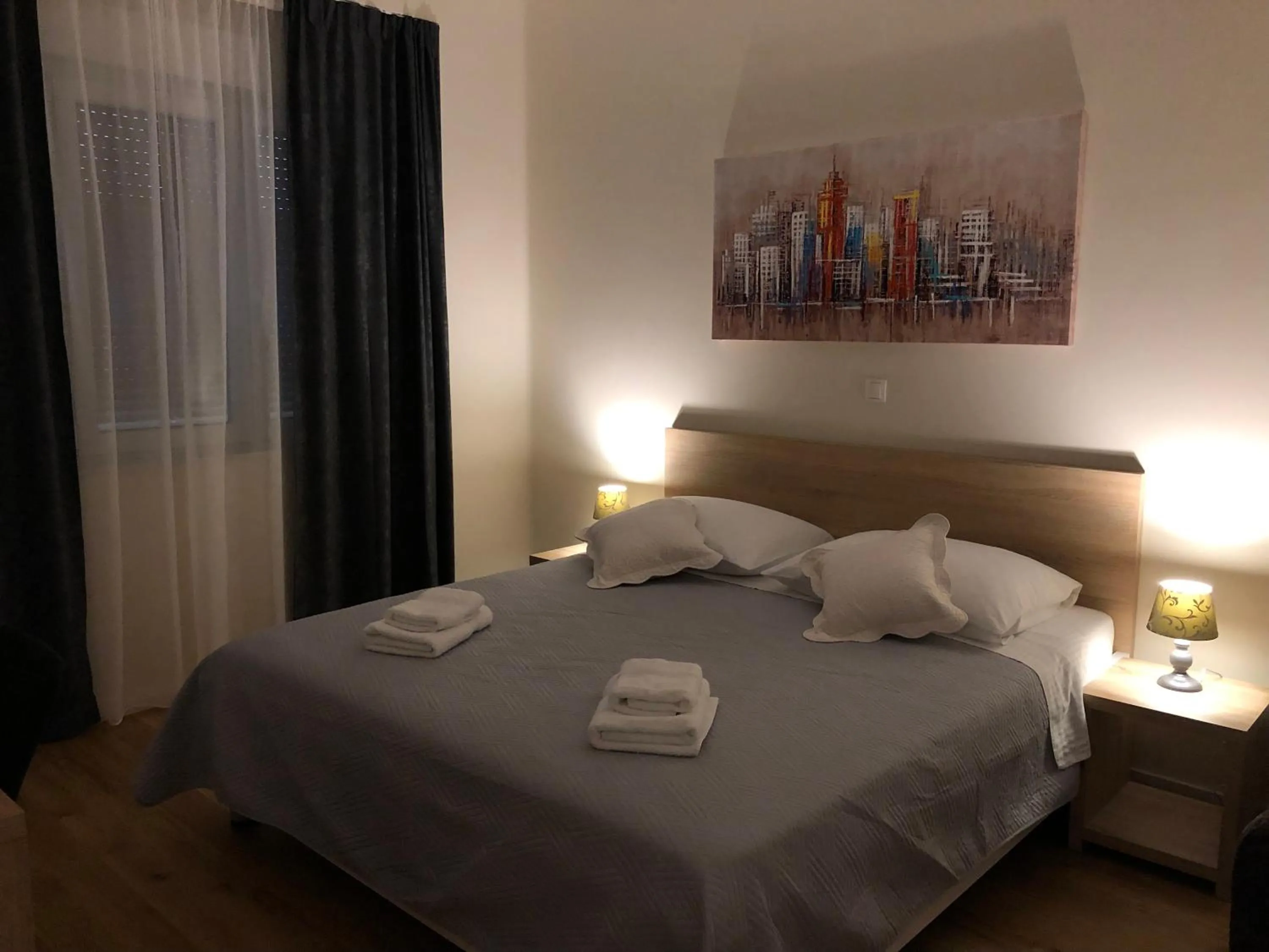 Bed in Tempus Apartment