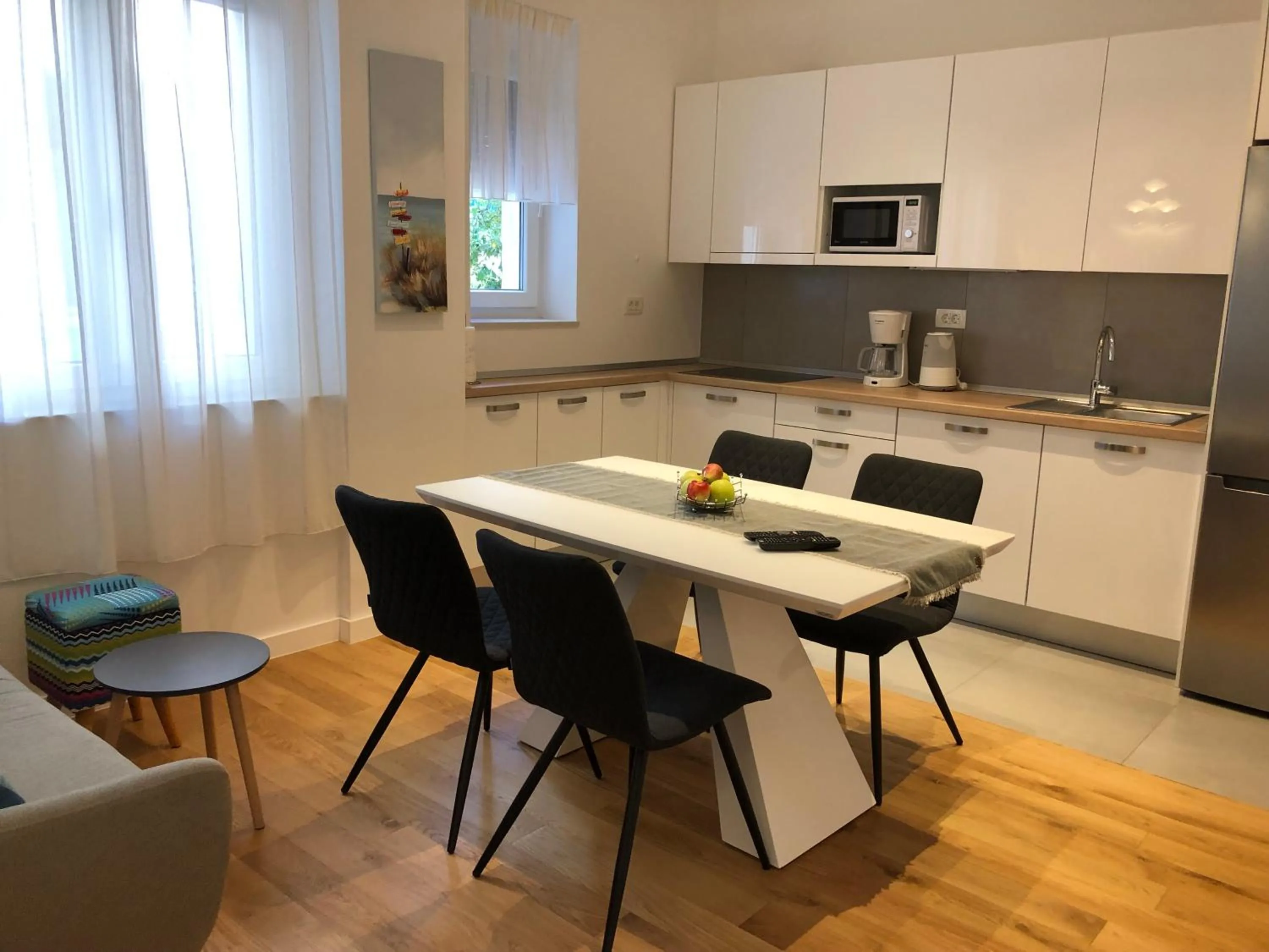 Kitchen or kitchenette in Tempus Apartment