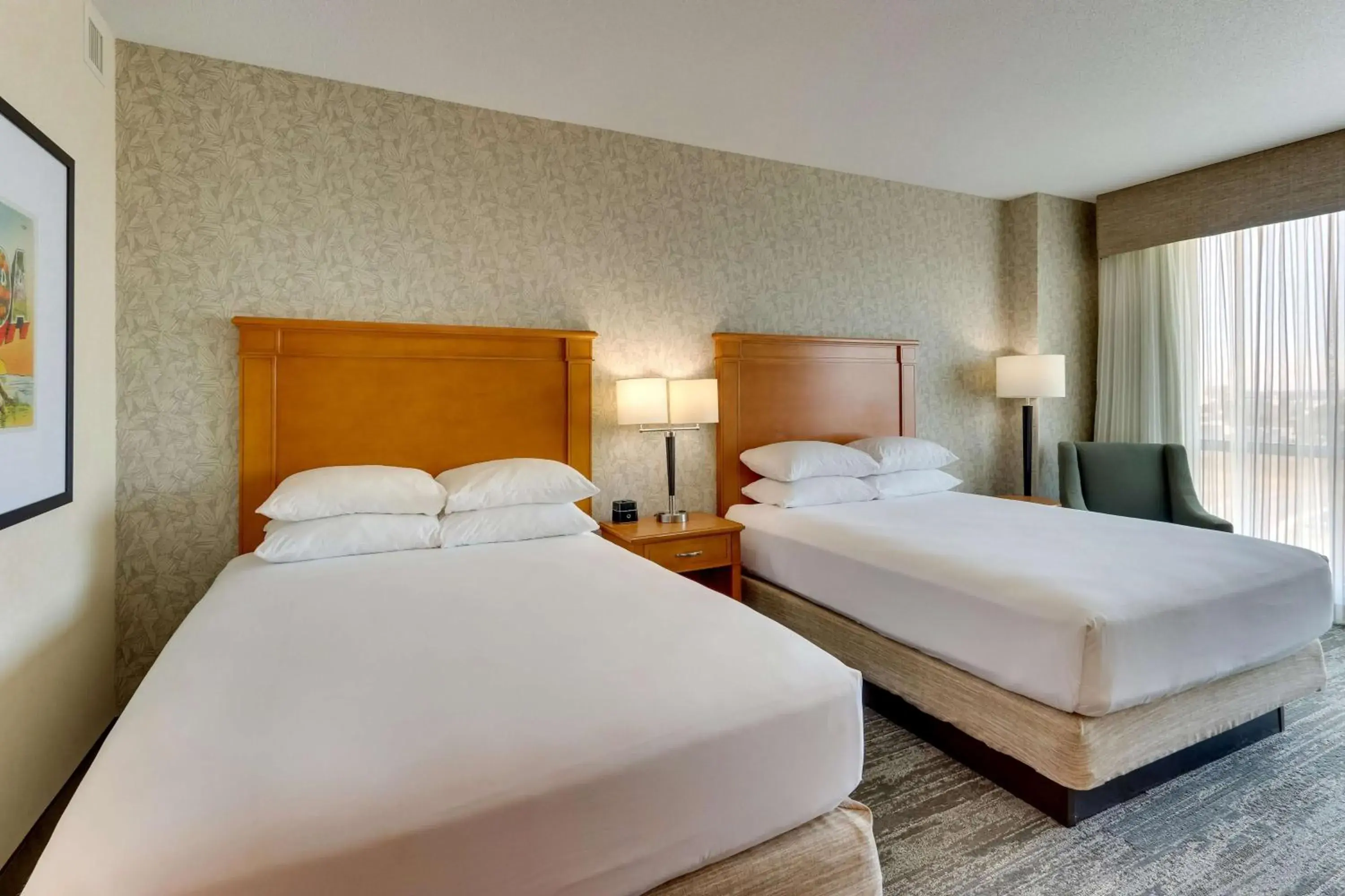 Deluxe Queen Room with Two Queen Beds - Accessible, Roll-in Shower in Drury Inn & Suites Orlando near Universal Orlando Resort Deluxe Queen Room with Two Queen Beds - Accessible, Roll-in Shower in Drury Inn & Suites Orlando near Universal Orlando Resort