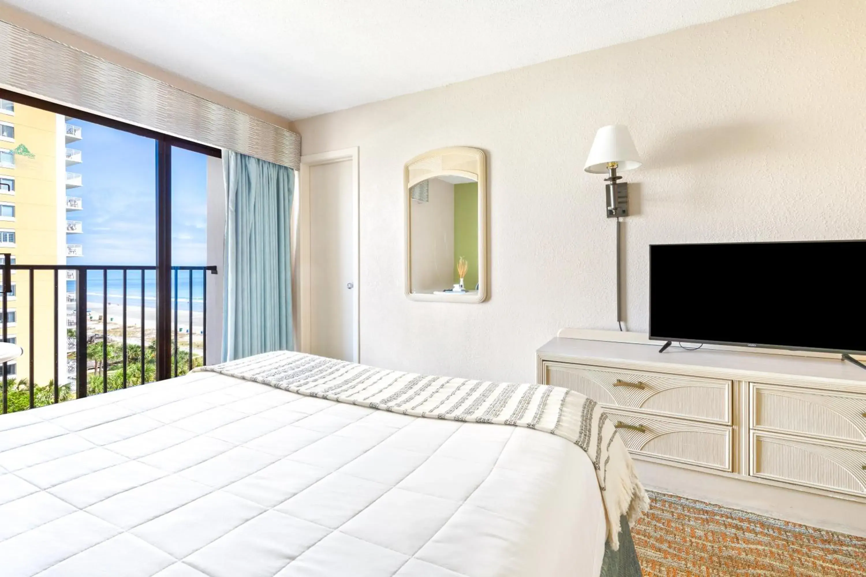 Bedroom in Sandcastle Oceanfront Resort at the Pavilion Bedroom in Sandcastle Oceanfront Resort at the Pavilion