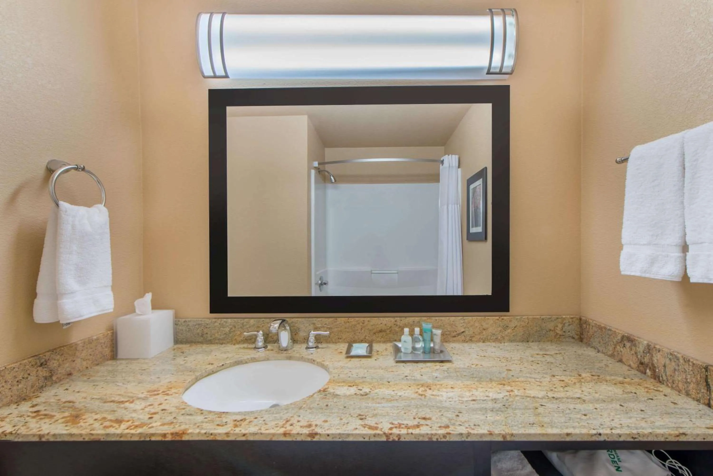 Bathroom in Wyndham Garden Oklahoma City Resort & Conference Hotel Near Airport, Fairgrounds Paycom & I40