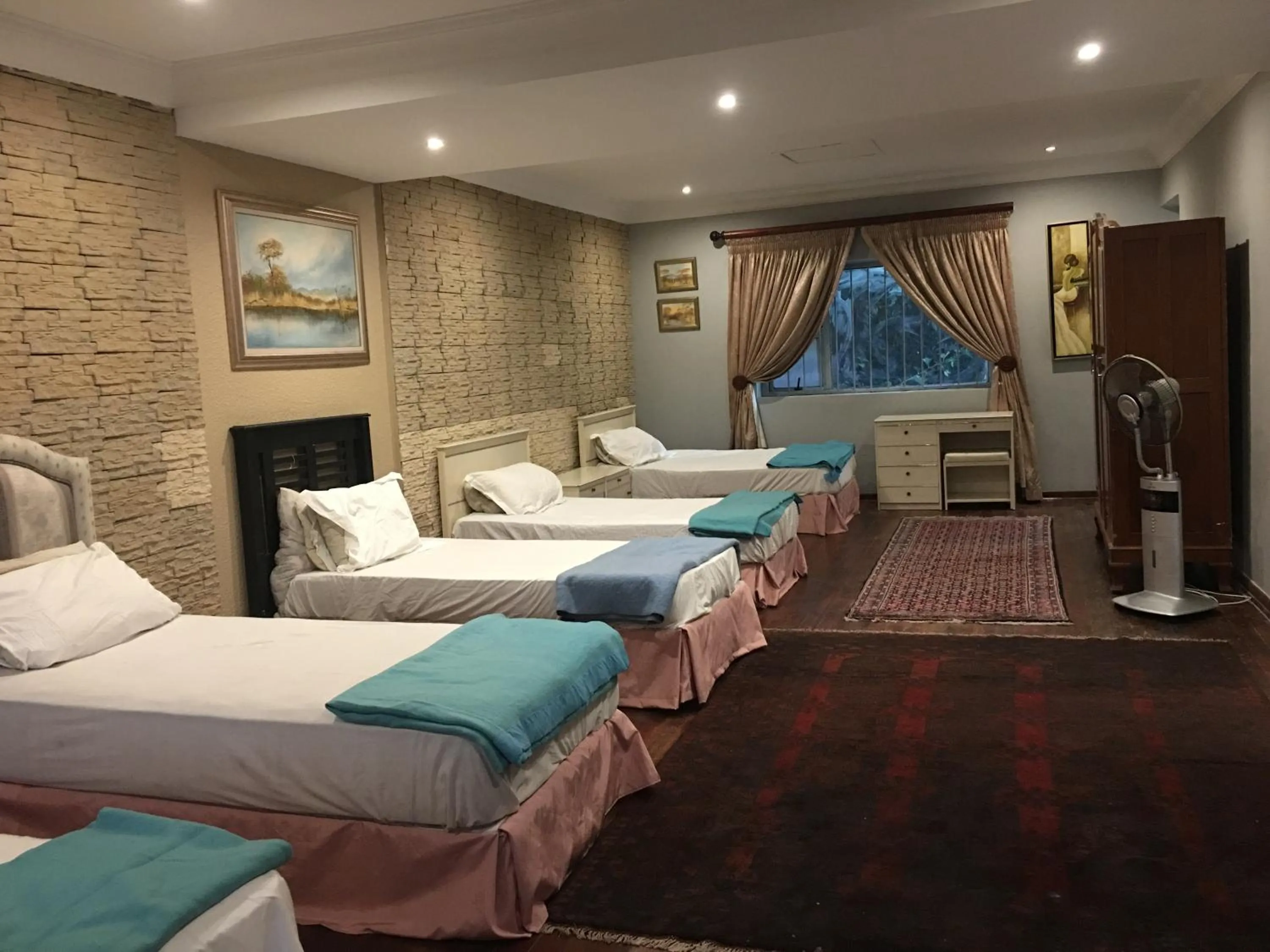 Photo of the whole room, Bed in The Afropolitan