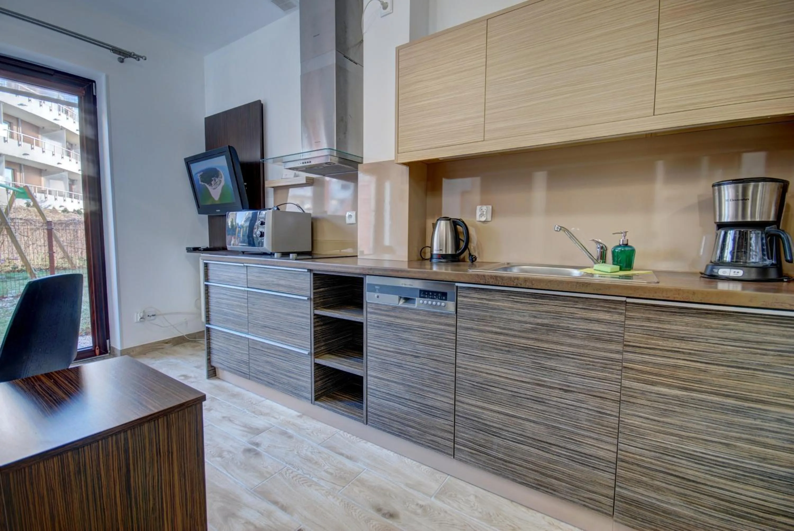 Kitchen or kitchenette in HelApart - Foka