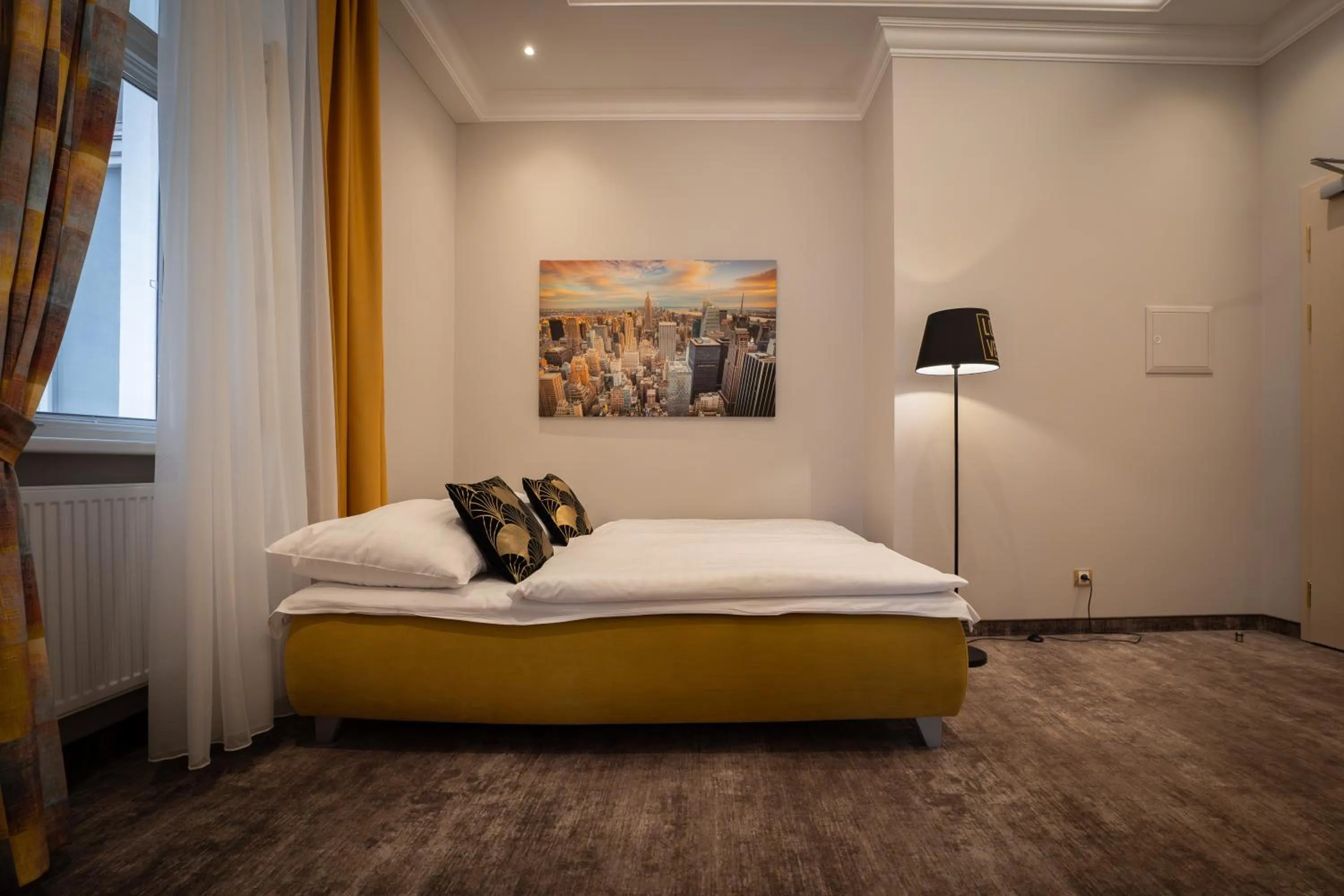 Bed in Golden Key Boutique Hotel