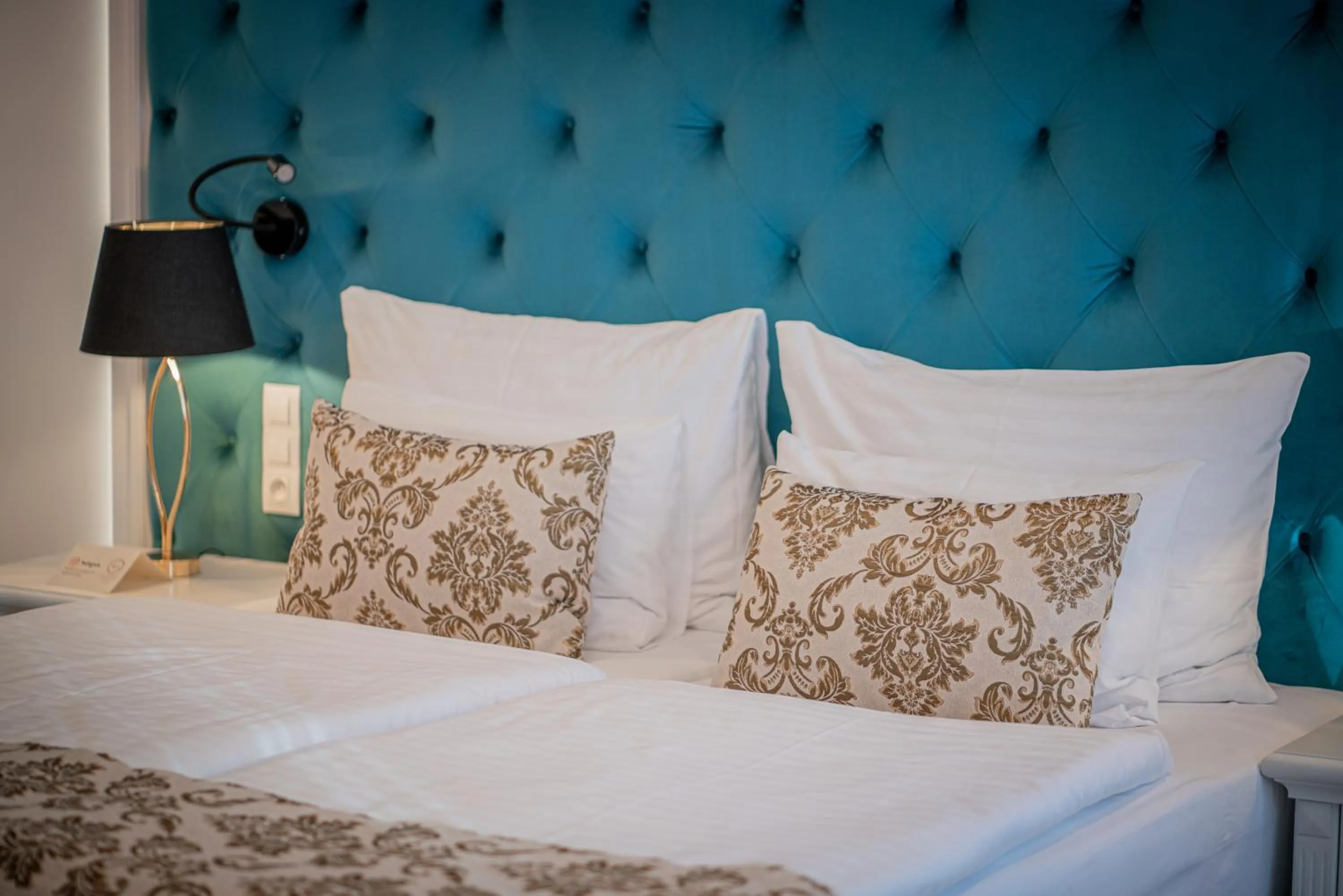 Bed in Golden Key Boutique Hotel
