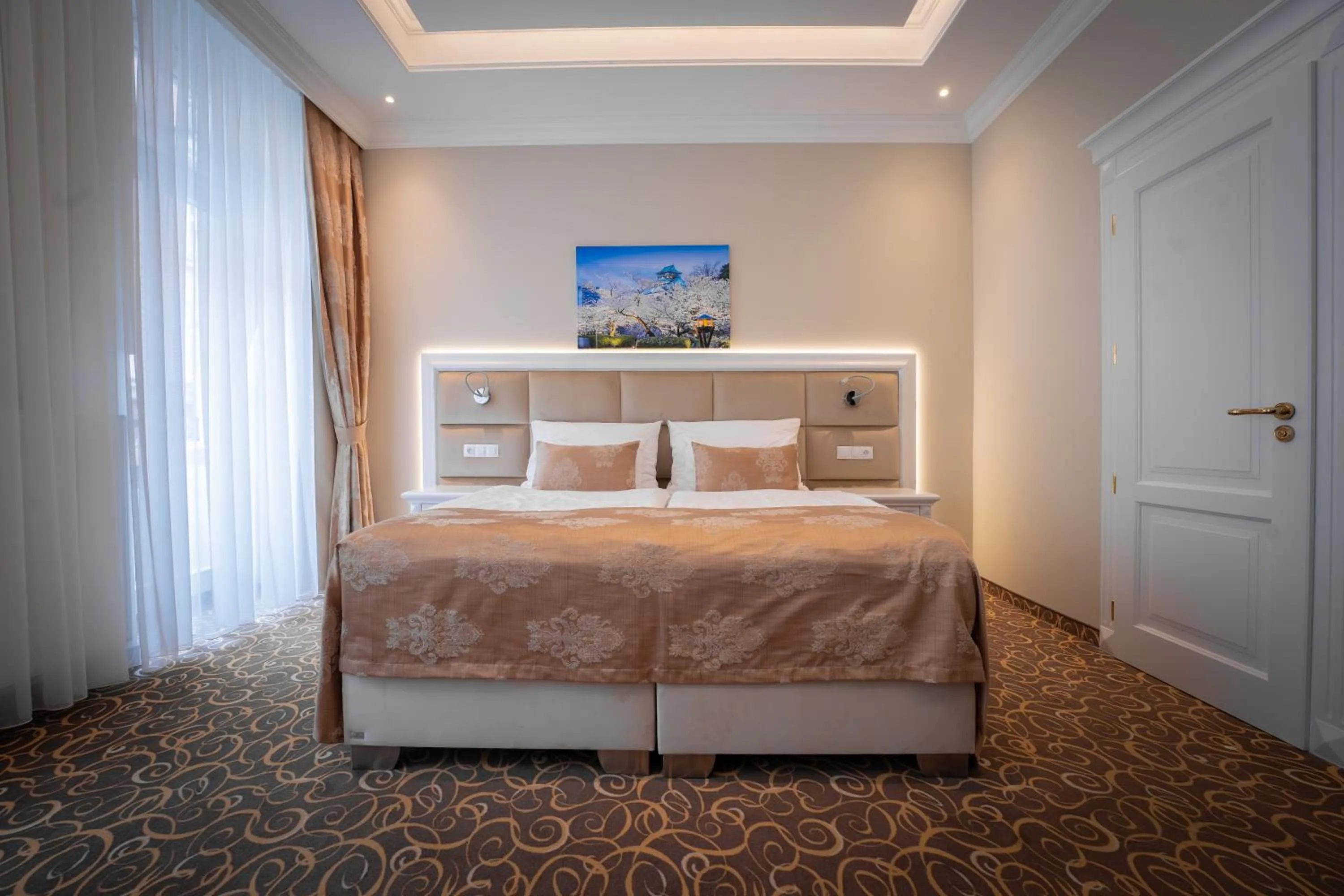 Bed in Golden Key Boutique Hotel