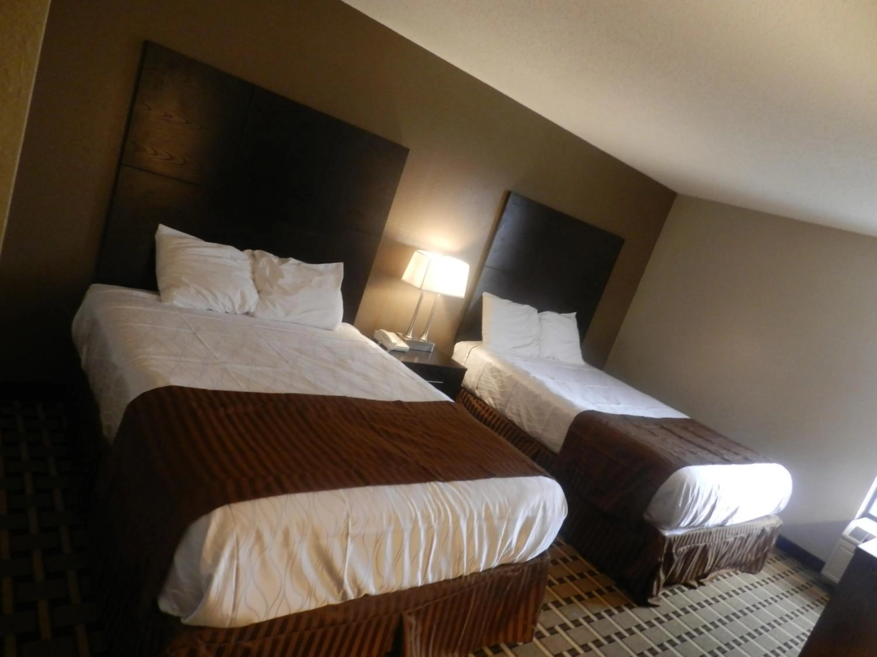 Bed in Haven Inn & Suites