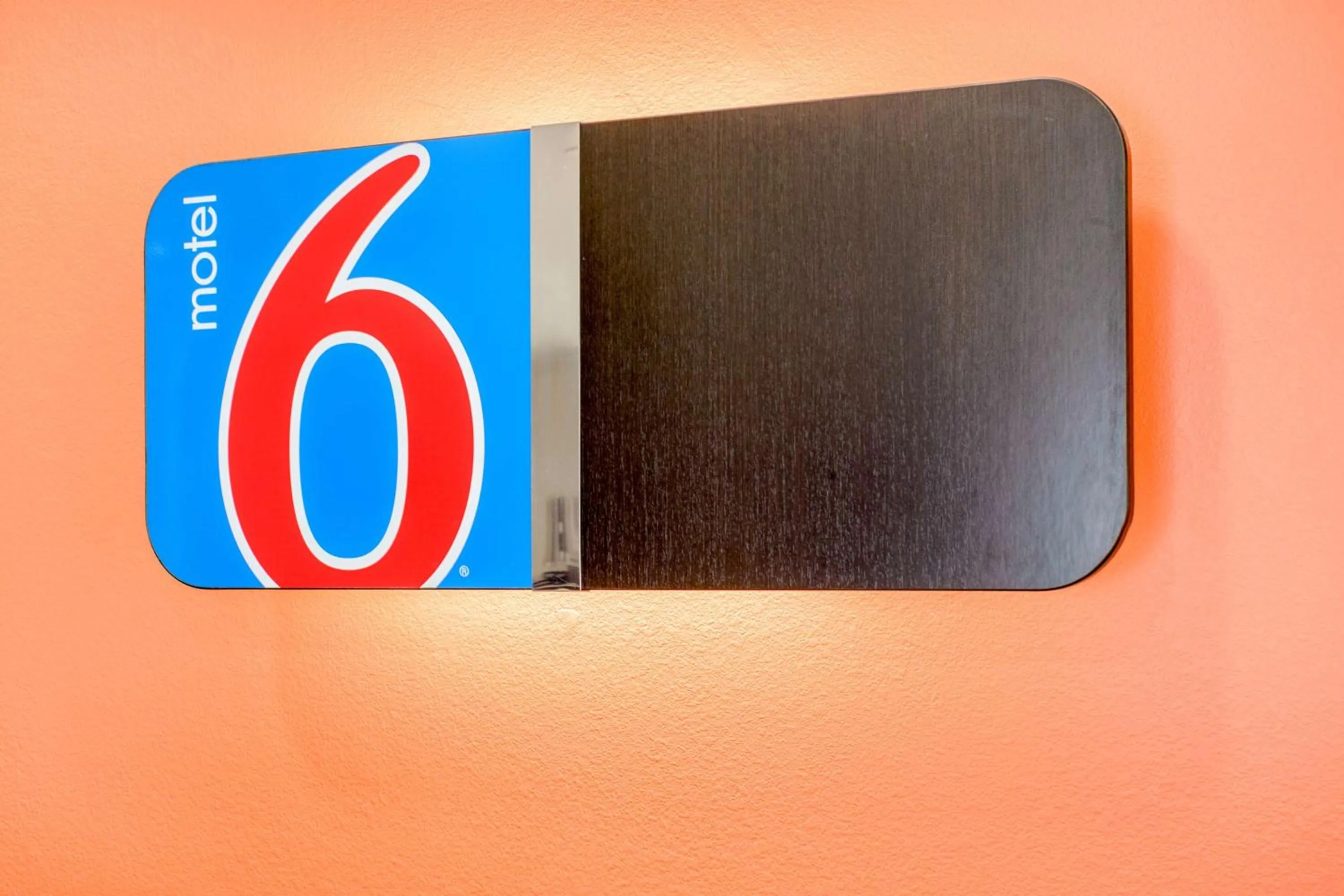 Property logo or sign in Motel 6-Canton, TX