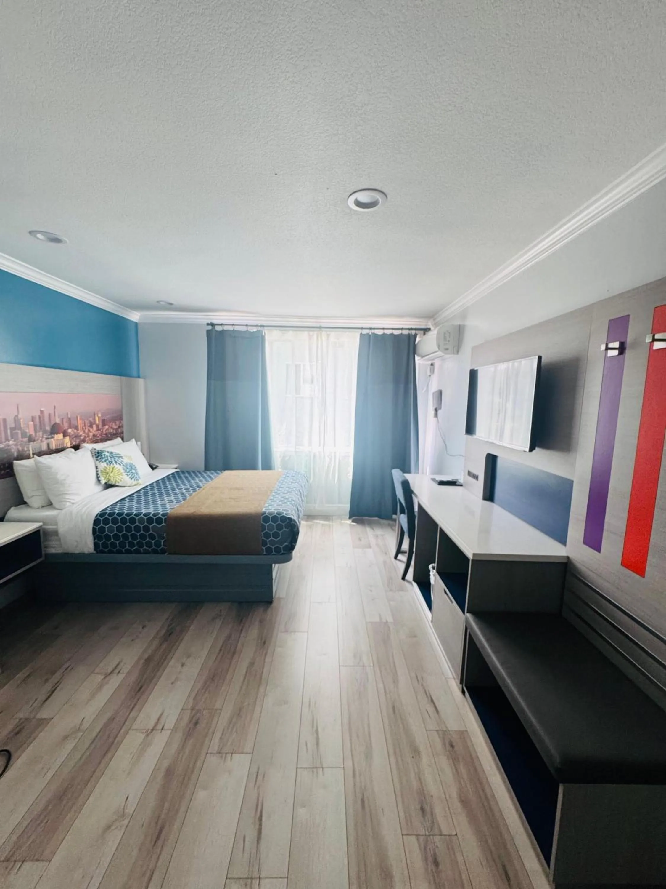 Bed in Hometel Suites