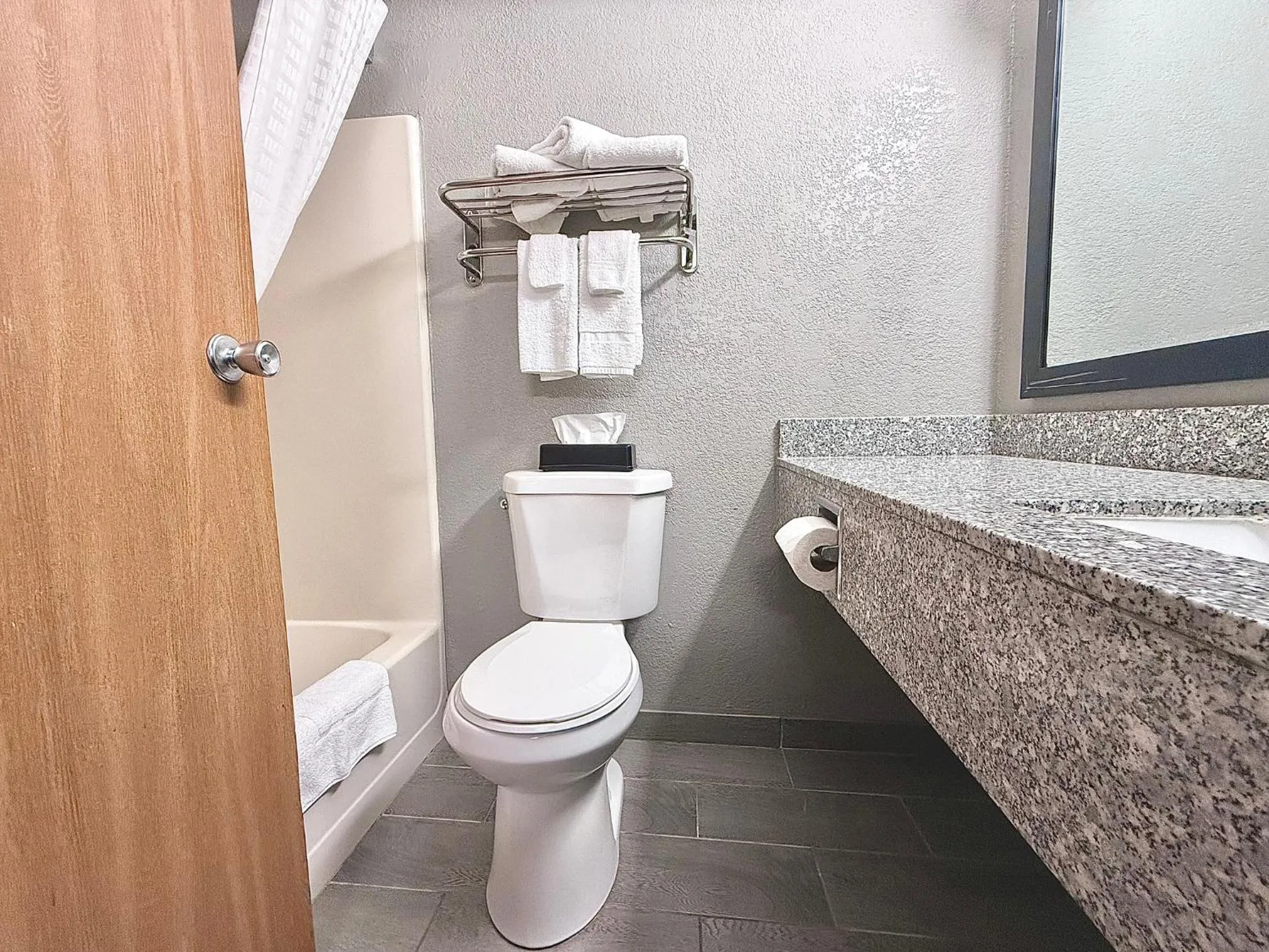 Toilet in American Inn Cedar Rapids South