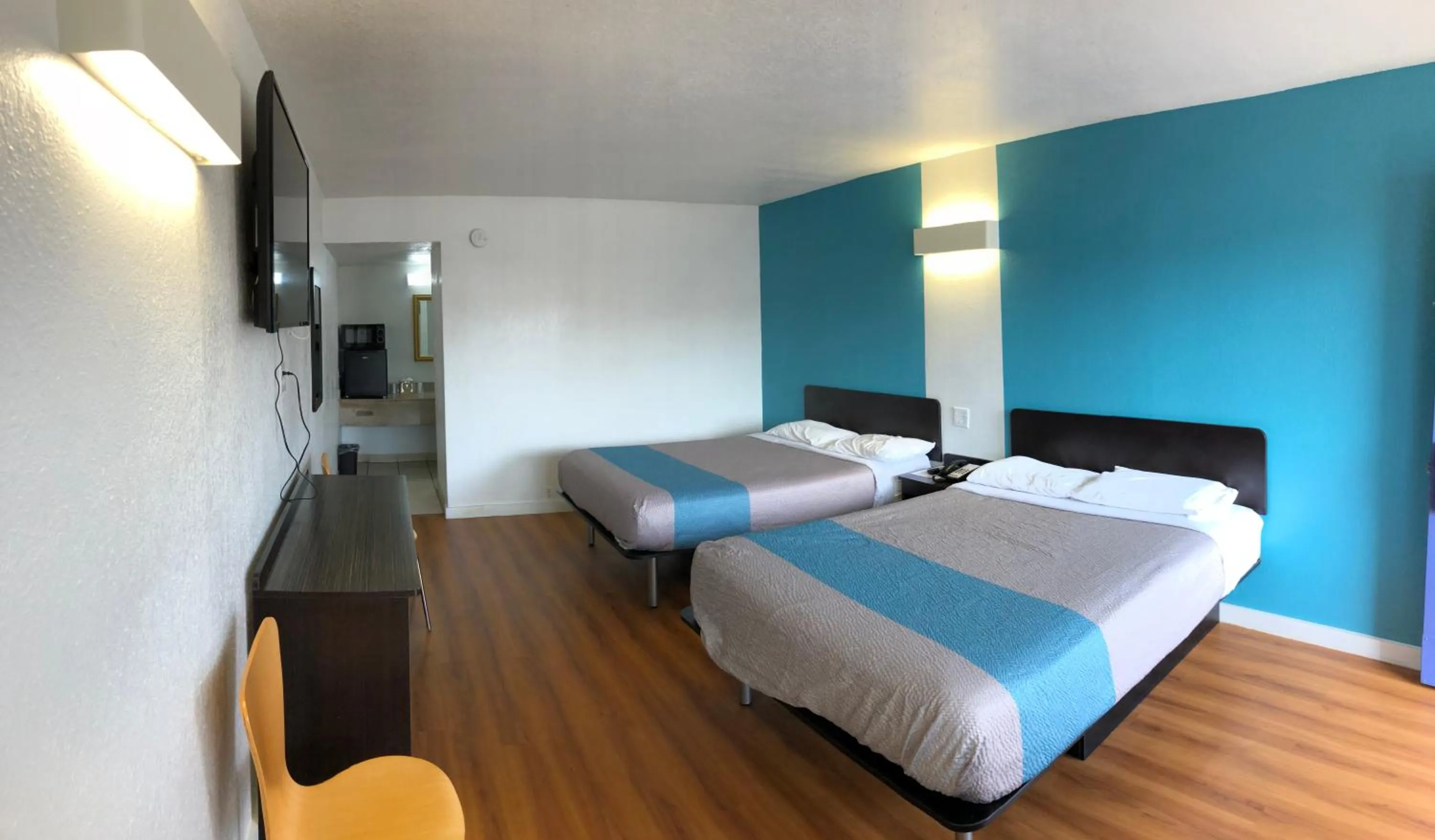 Bed in Trade Wind Motel