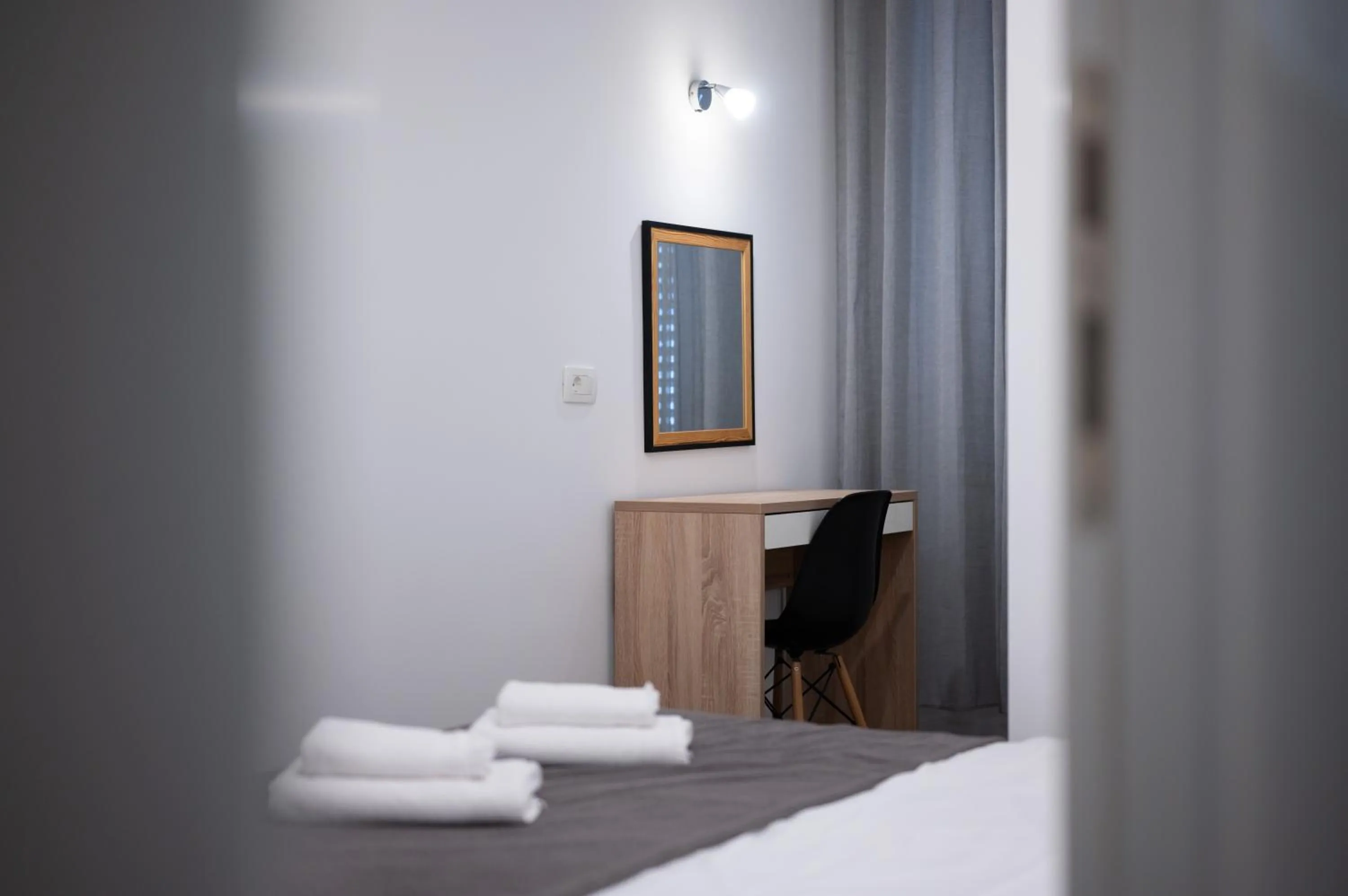 Bed in Pyrotima Apartments