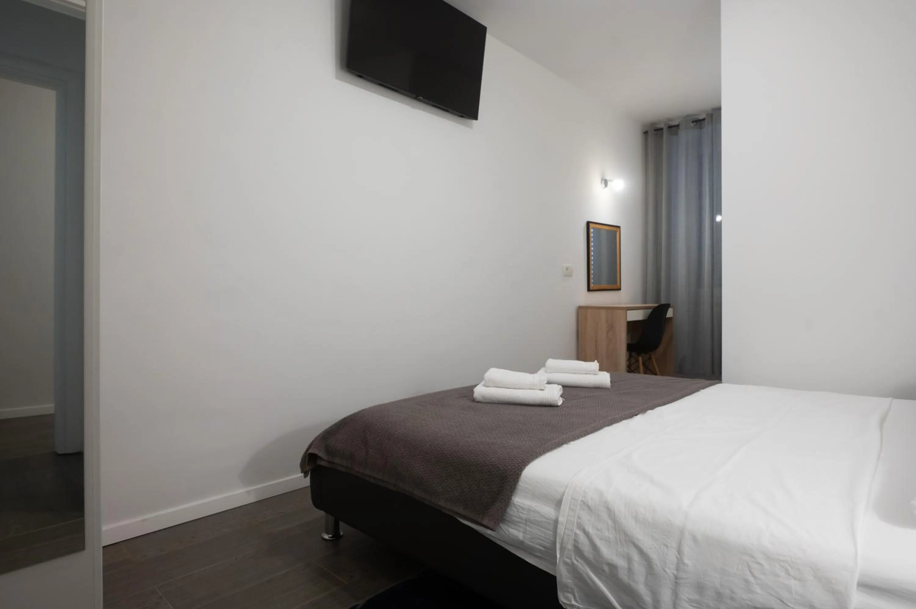 Bed in Pyrotima Apartments