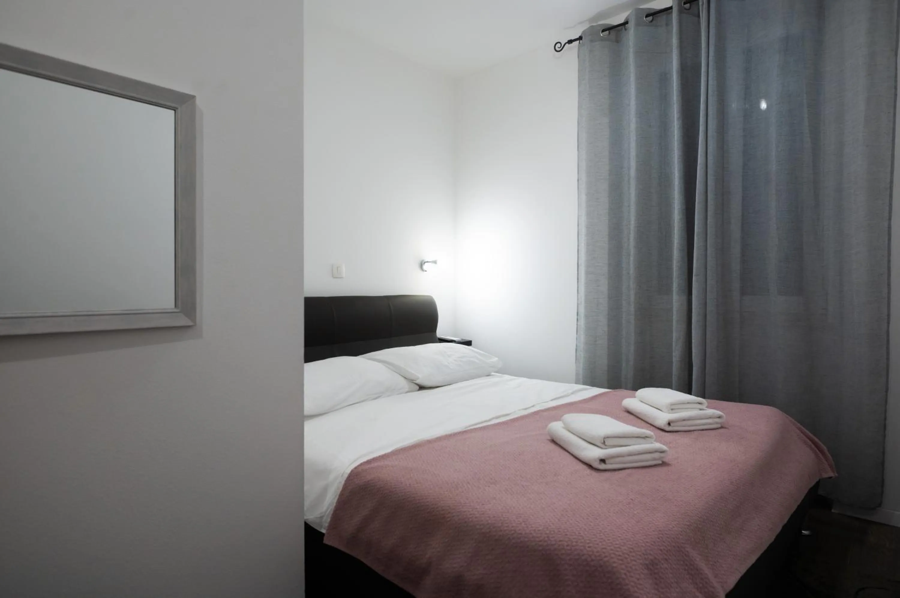 Bed in Pyrotima Apartments