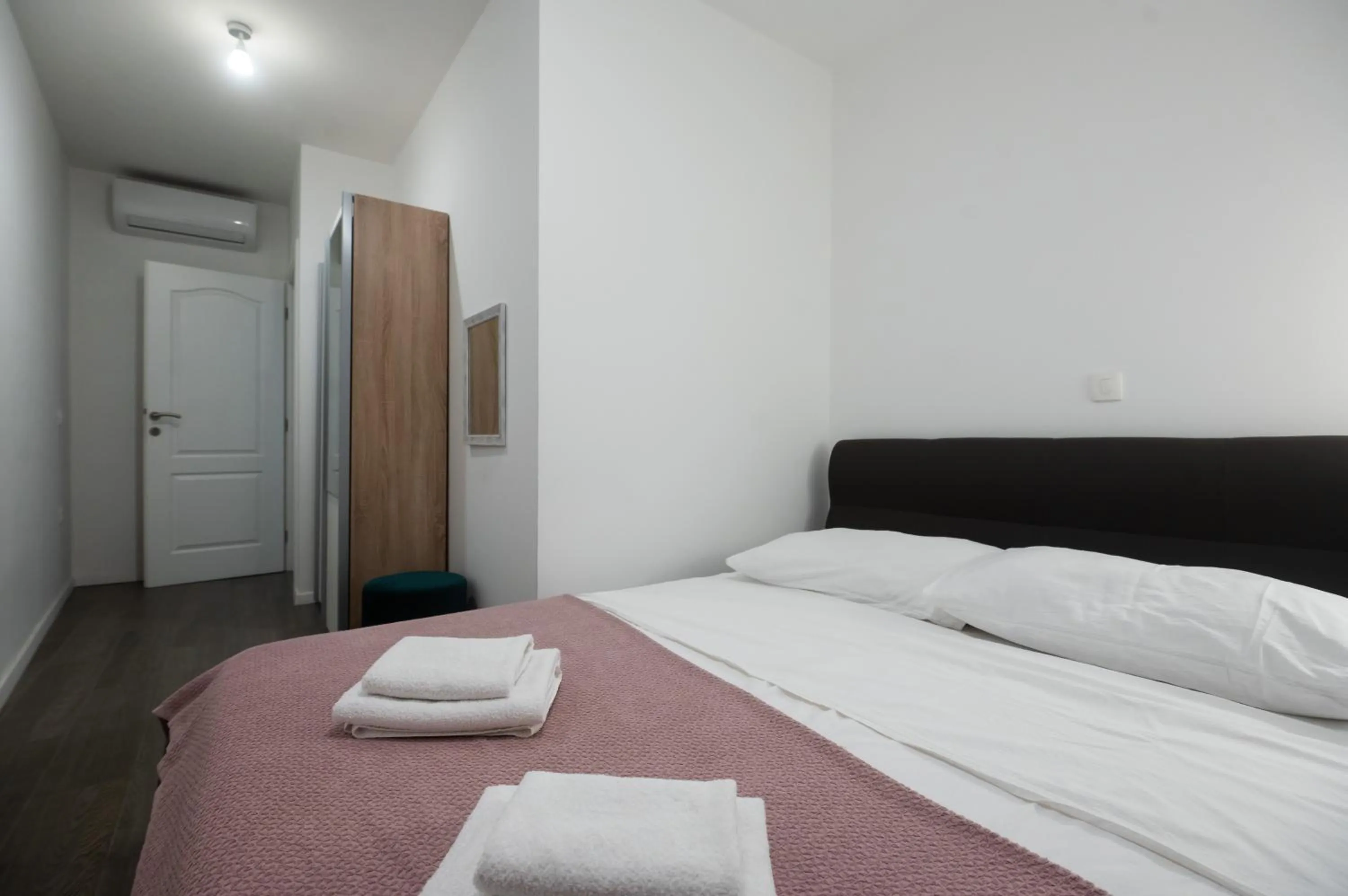 Bed in Pyrotima Apartments