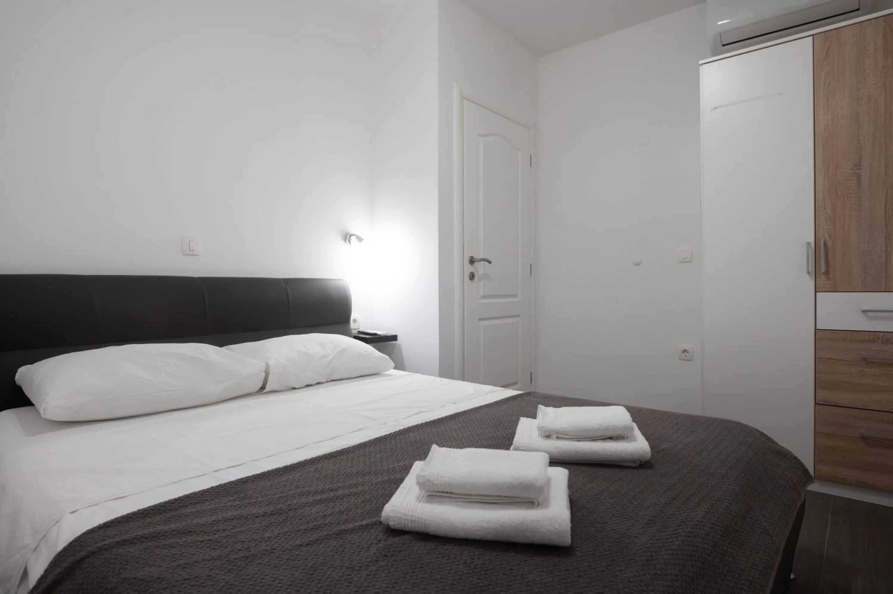 Bed in Pyrotima Apartments