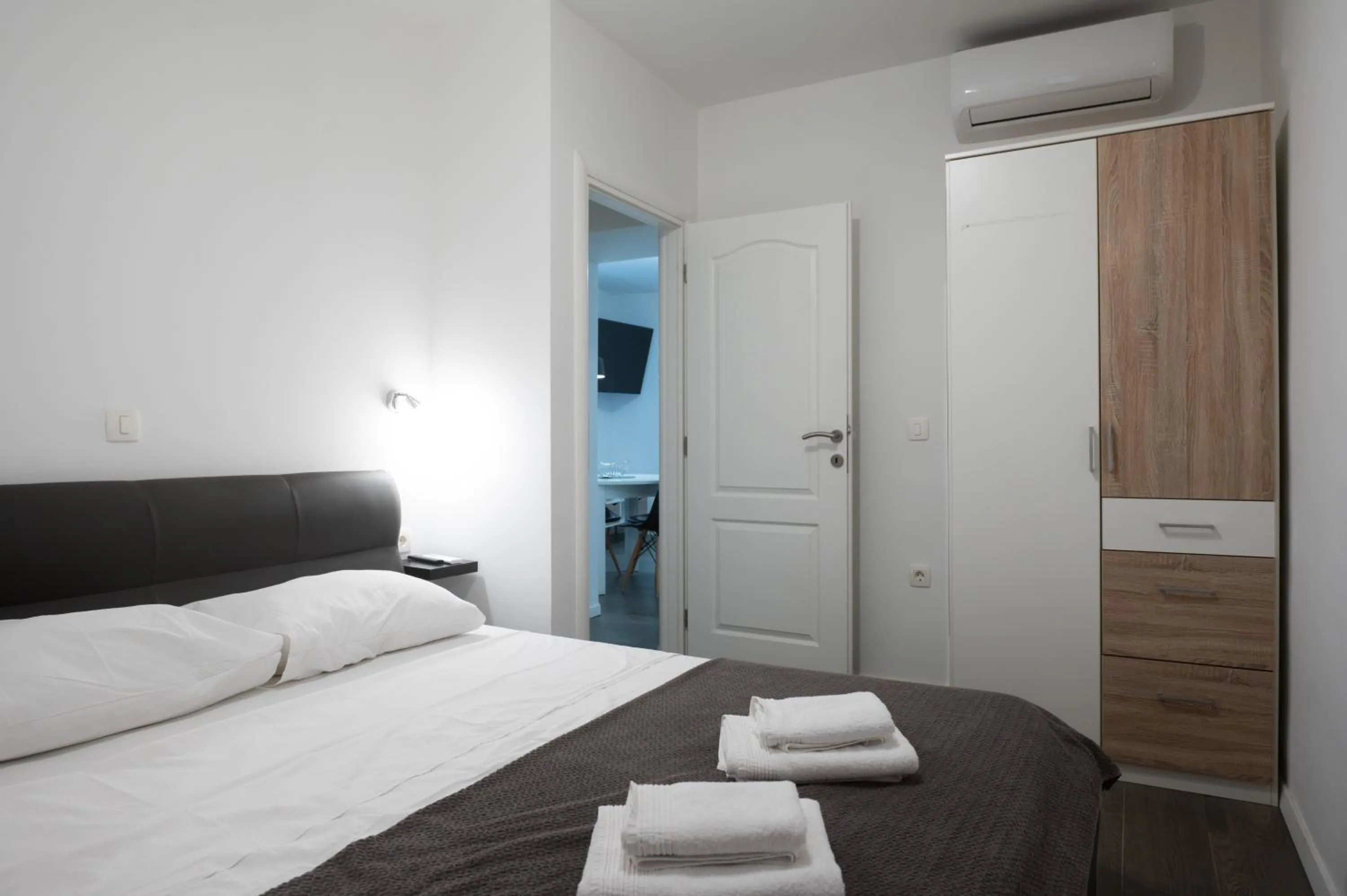 Bed in Pyrotima Apartments