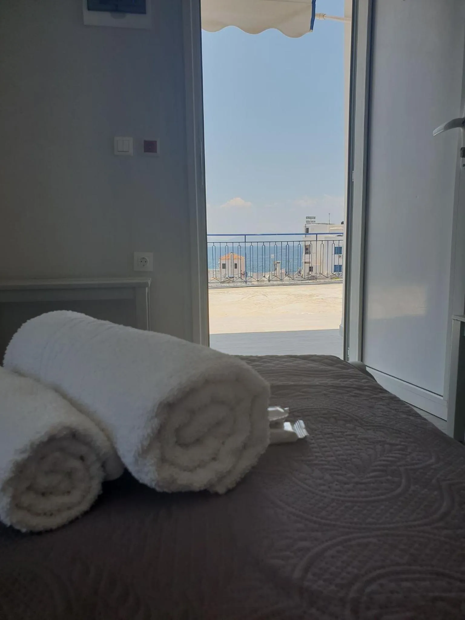 Bed in Aphrodite Art Hotel Aegina