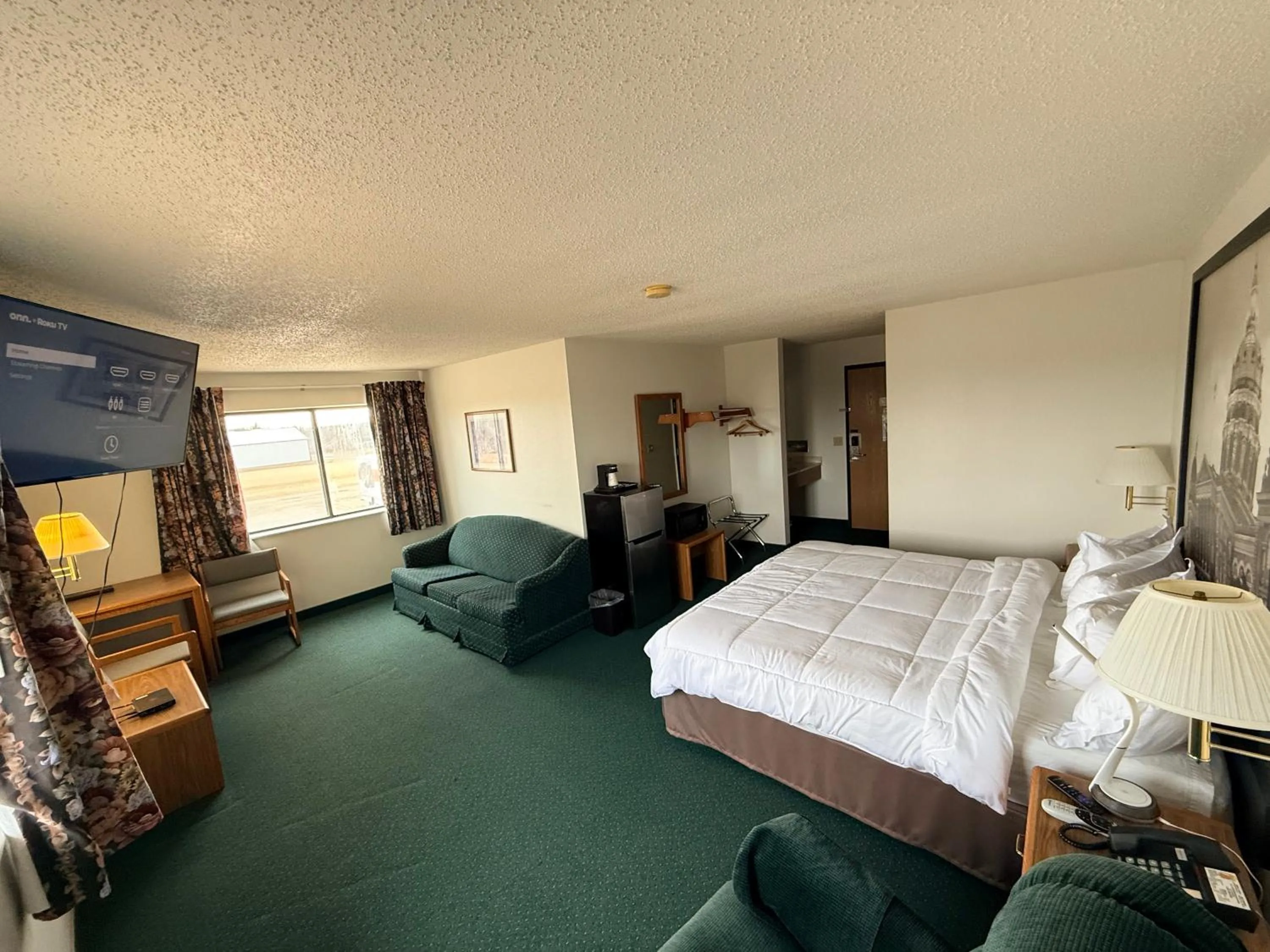 Bed in Budget inn & Suites