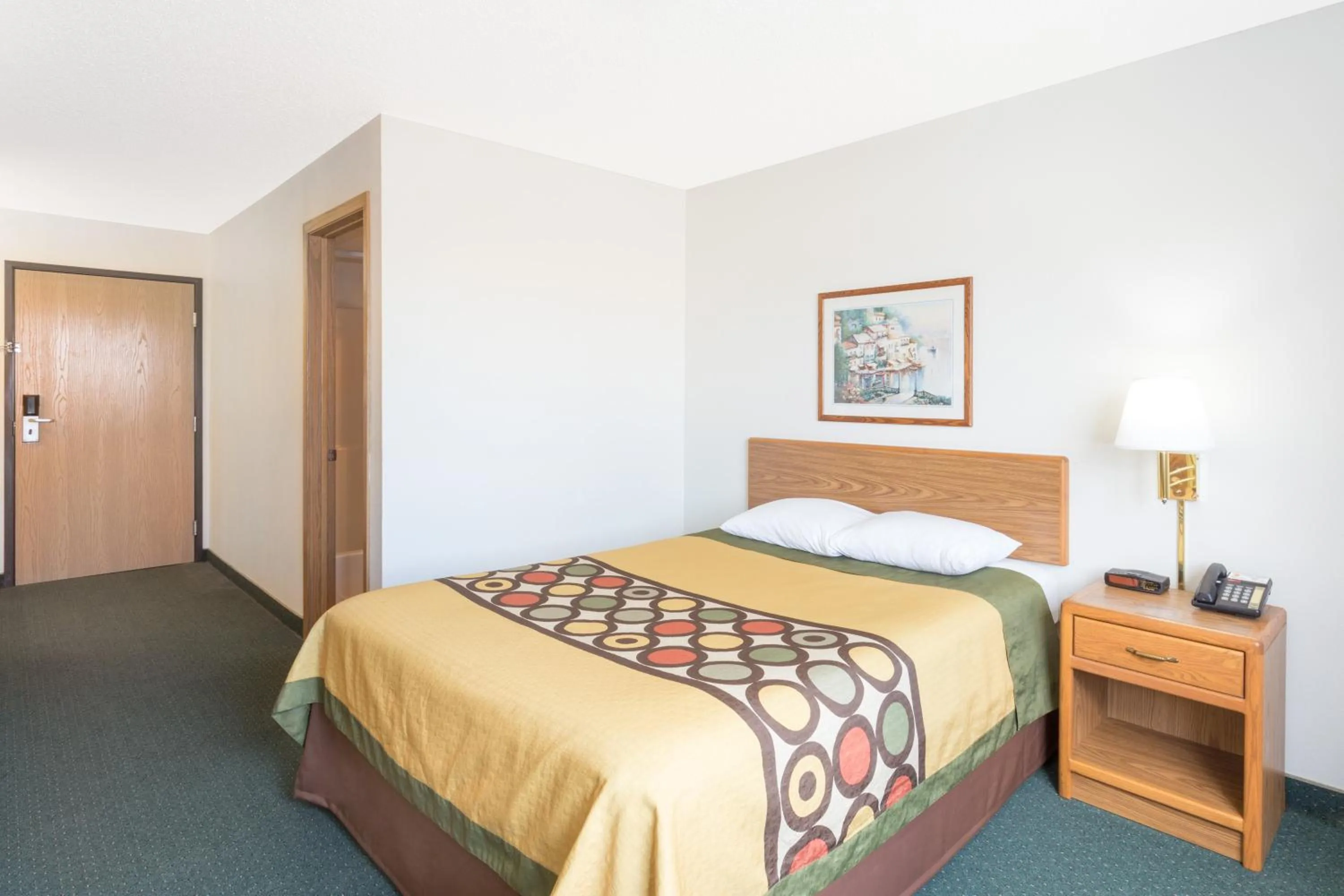 Bed in Budget inn & Suites