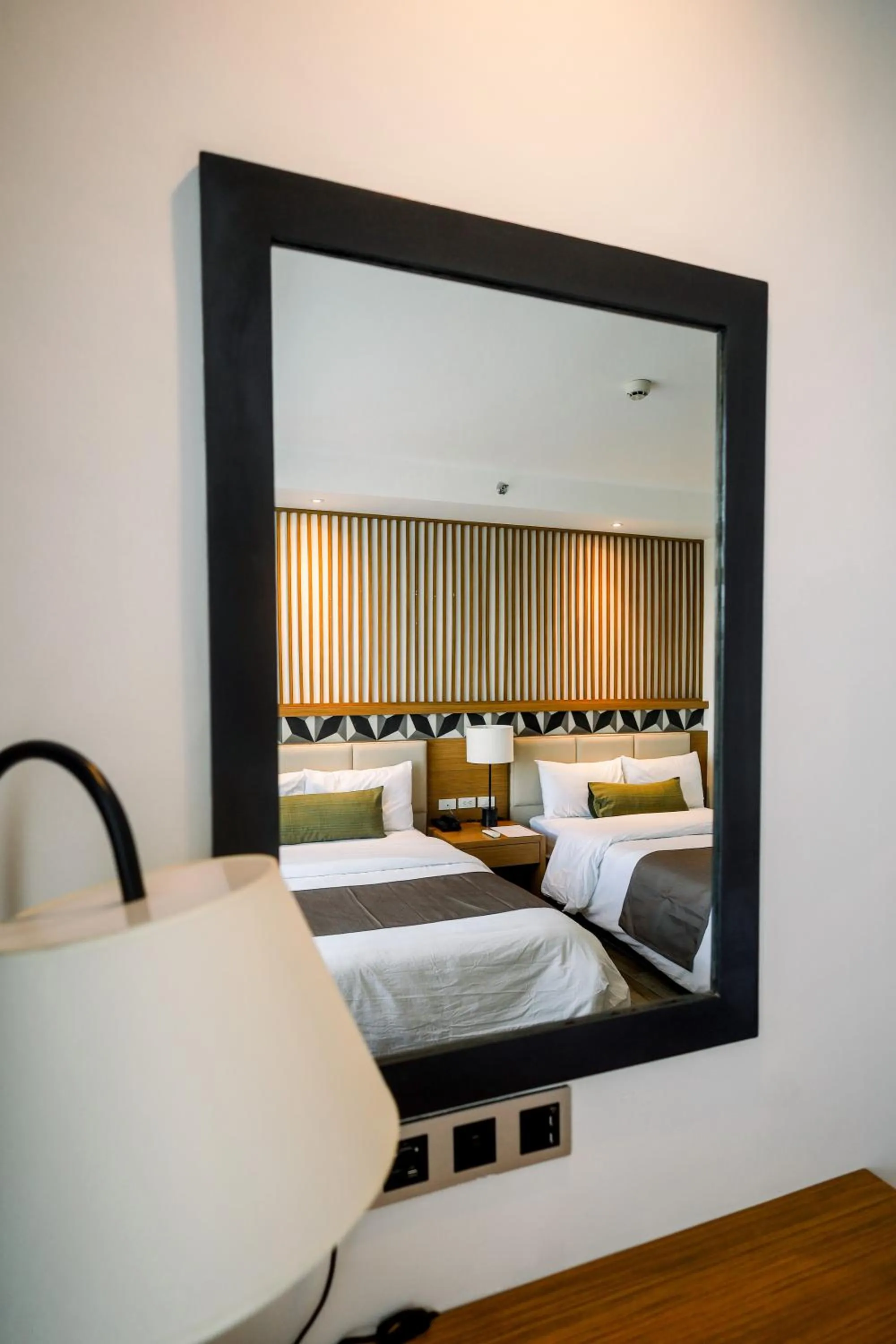 Bed in Crown Hotel at Harbour Springs Palawan Managed by Enderun Hotels