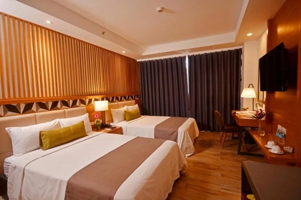 Photo of the whole room, Bed in Crown Hotel at Harbour Springs Palawan Managed by Enderun Hotels