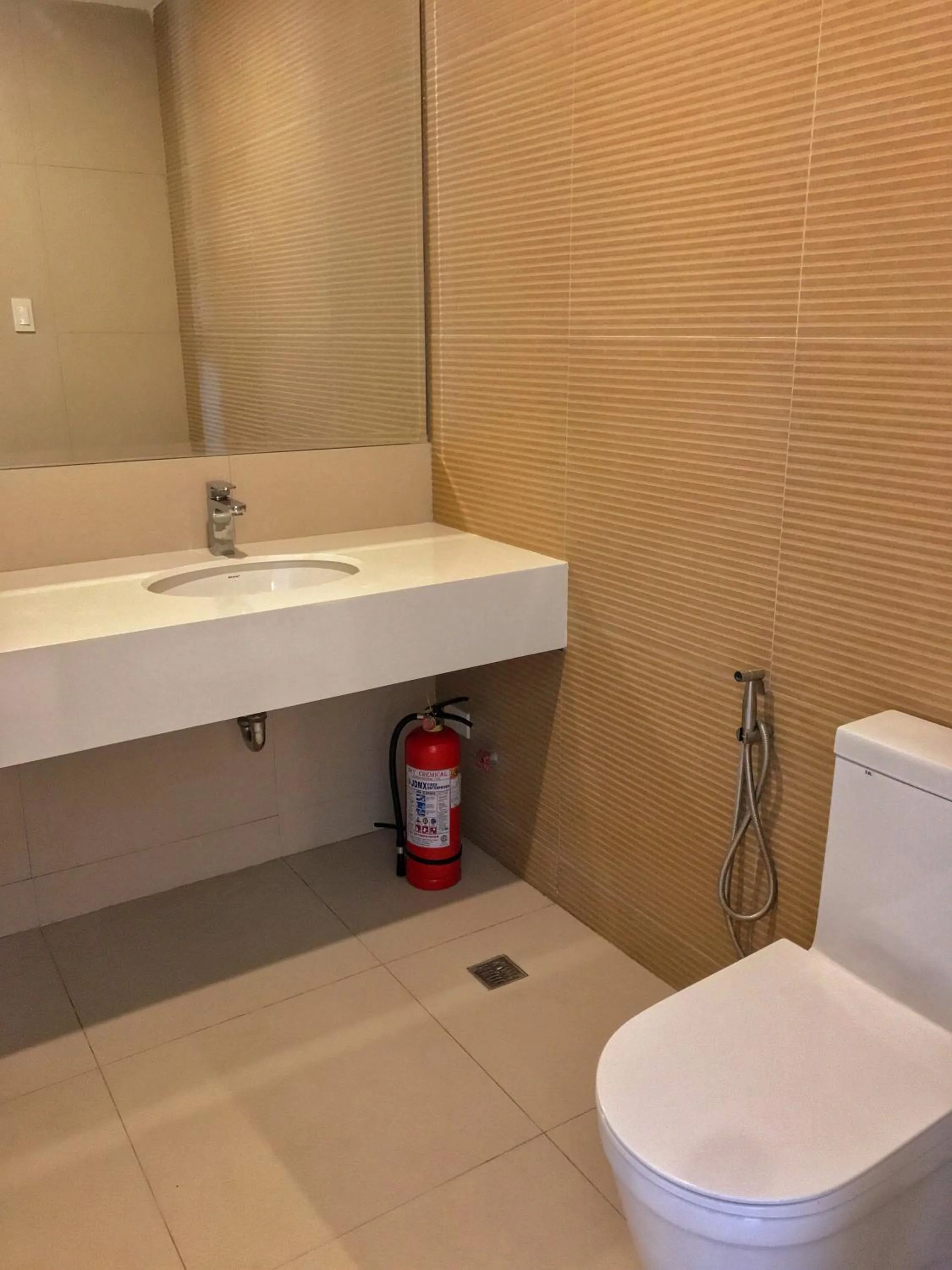 Toilet in Crown Hotel at Harbour Springs Palawan Managed by Enderun Hotels