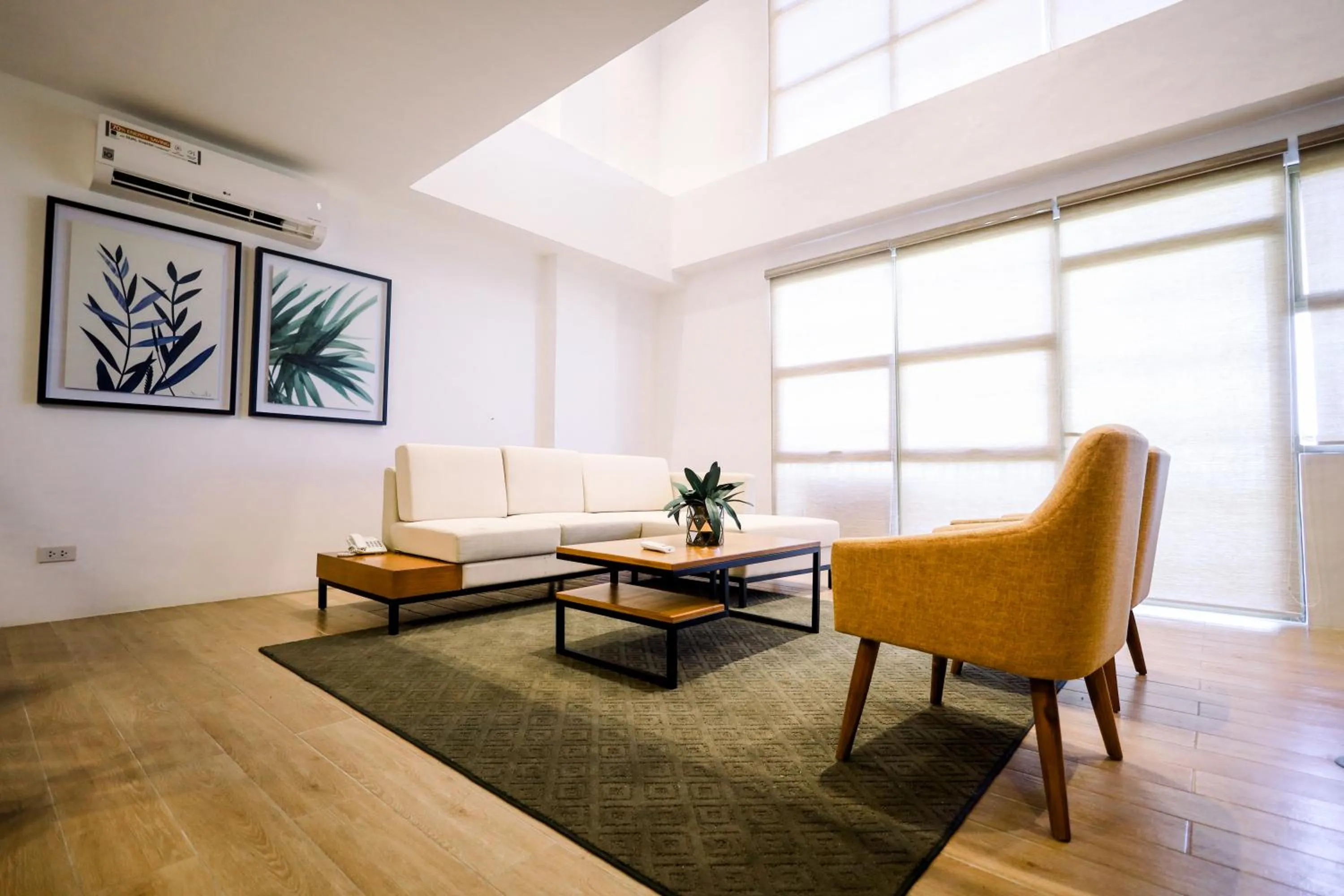 Living room in Crown Hotel at Harbour Springs Palawan Managed by Enderun Hotels