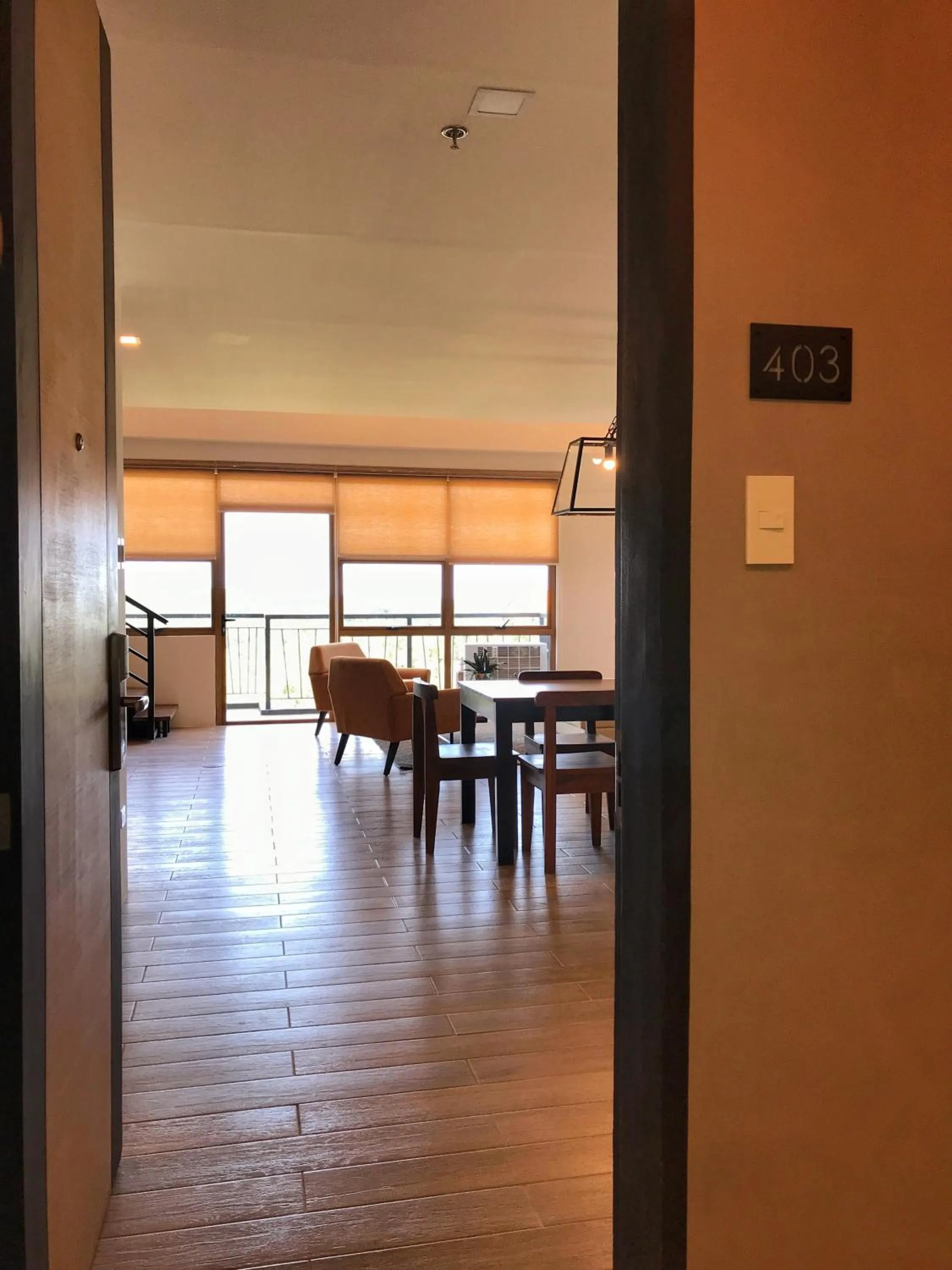 Living room in Crown Hotel at Harbour Springs Palawan Managed by Enderun Hotels