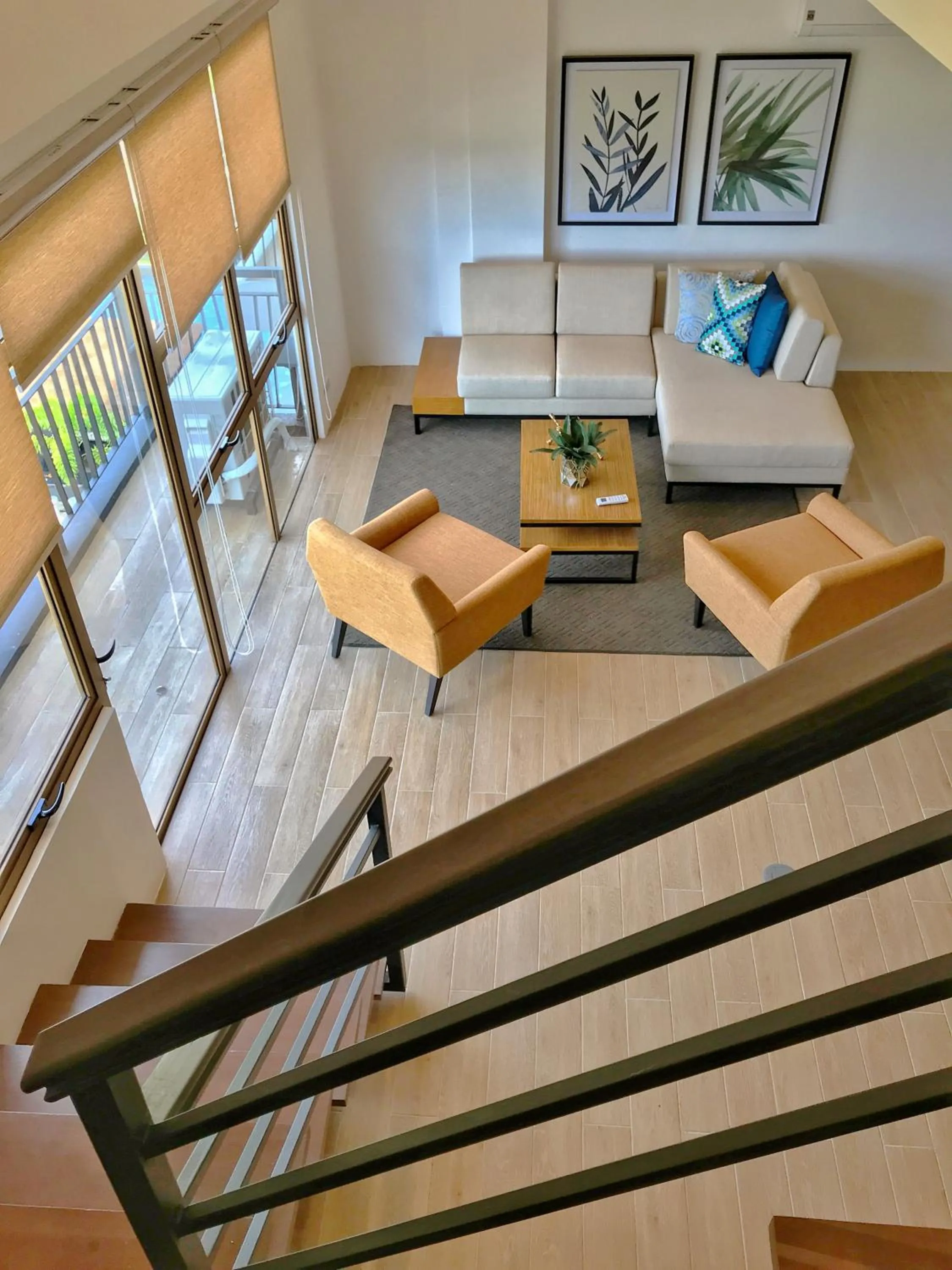 Living room in Crown Hotel at Harbour Springs Palawan Managed by Enderun Hotels