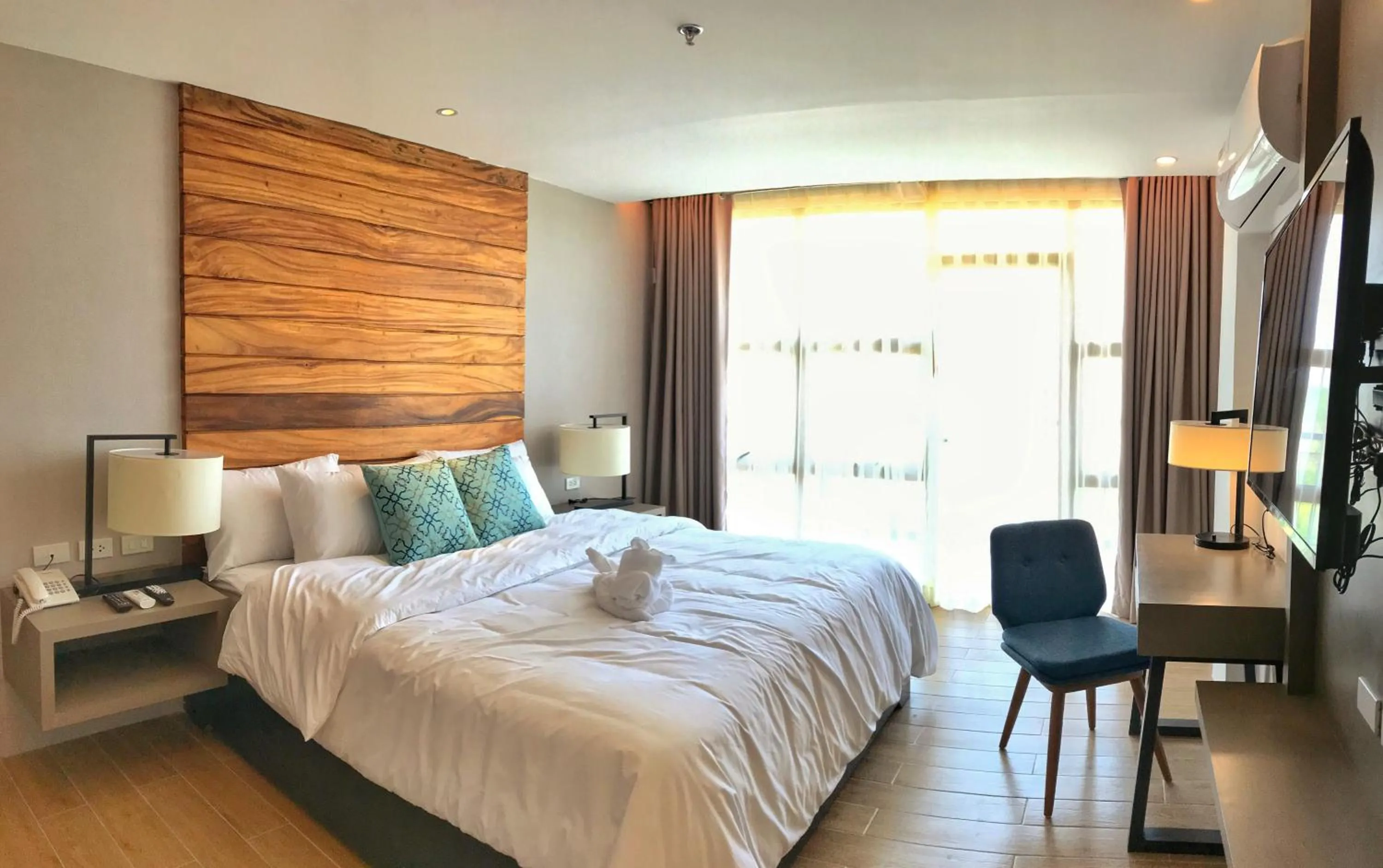 Bed in Crown Hotel at Harbour Springs Palawan Managed by Enderun Hotels