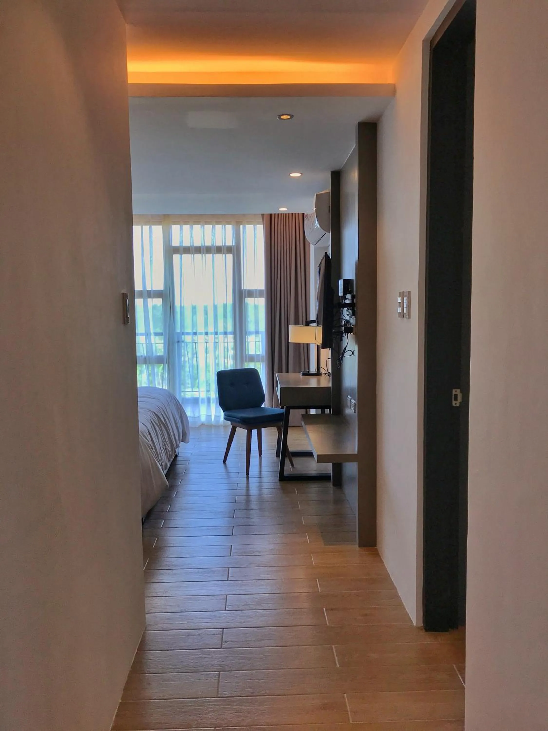 Photo of the whole room, Bed in Crown Hotel at Harbour Springs Palawan Managed by Enderun Hotels