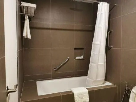 Shower in Crown Hotel at Harbour Springs Palawan Managed by Enderun Hotels