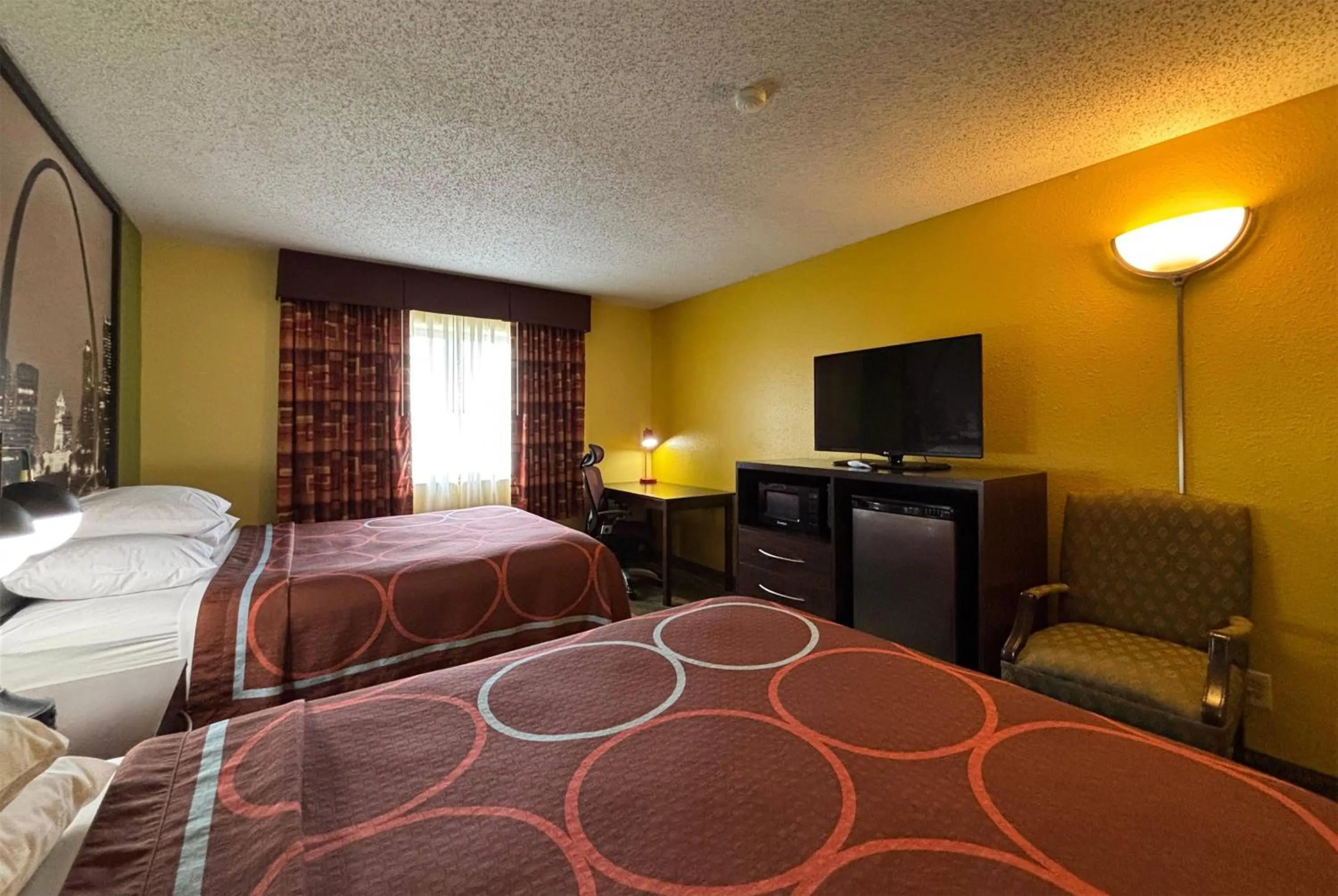 Photo of the whole room, Bed in Super 8 by Wyndham Jacksonville