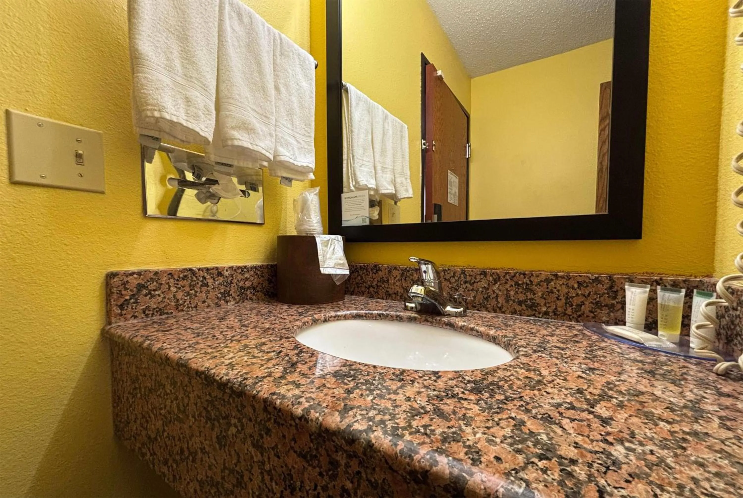 Bathroom in Super 8 by Wyndham Jacksonville