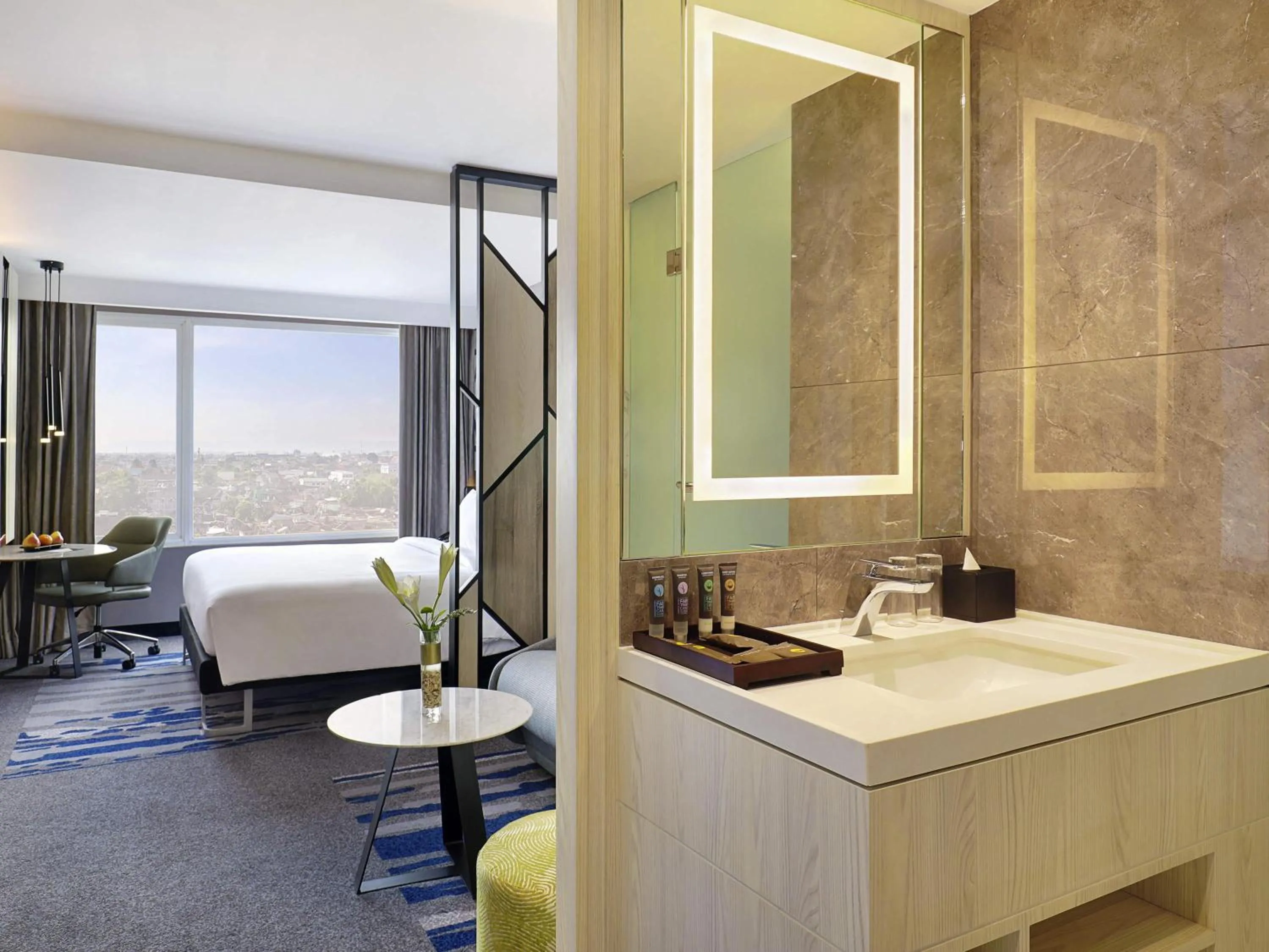 Bathroom, Bed in Novotel Suites Yogyakarta Malioboro
