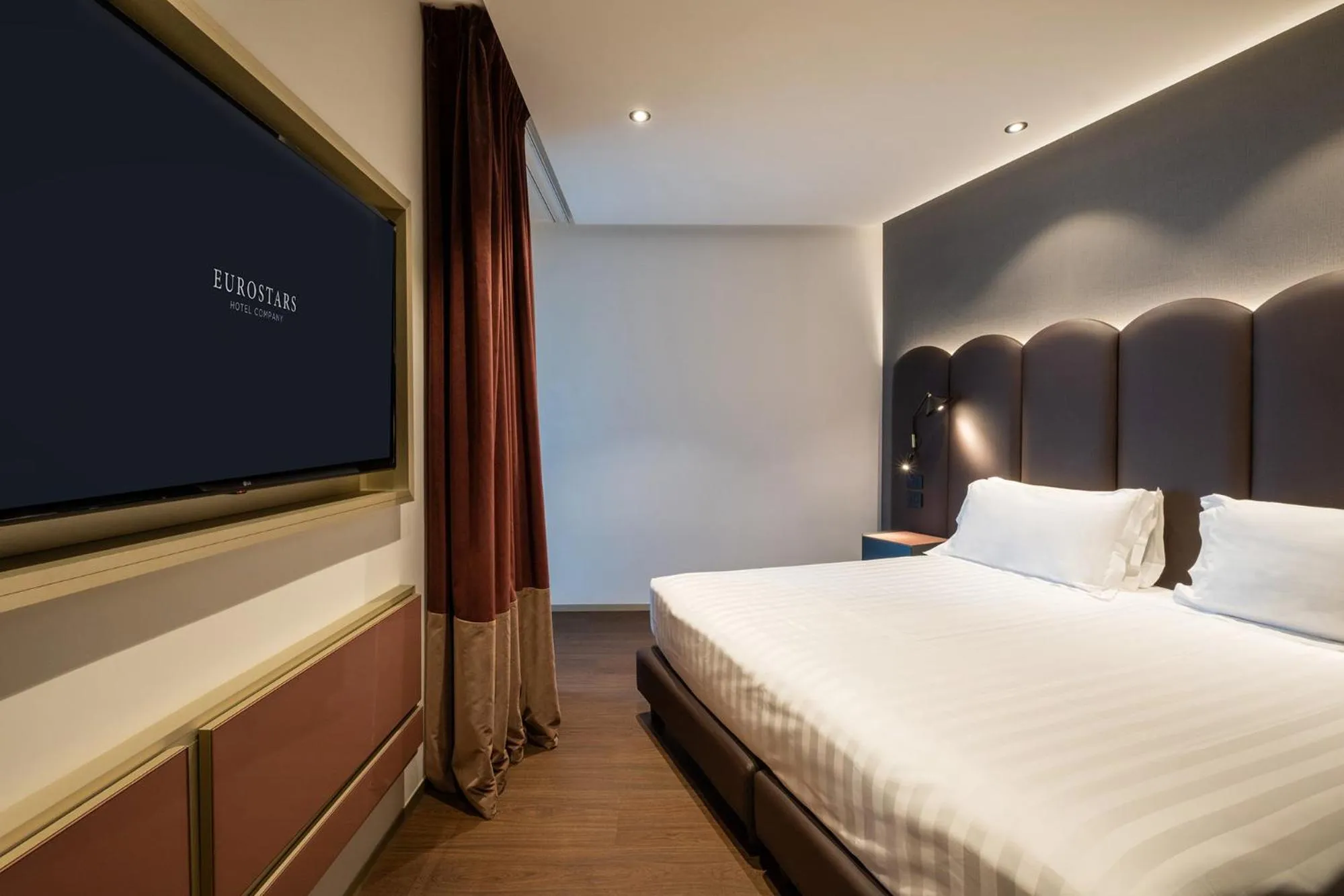 Bed in Eurostars Matera La Suite