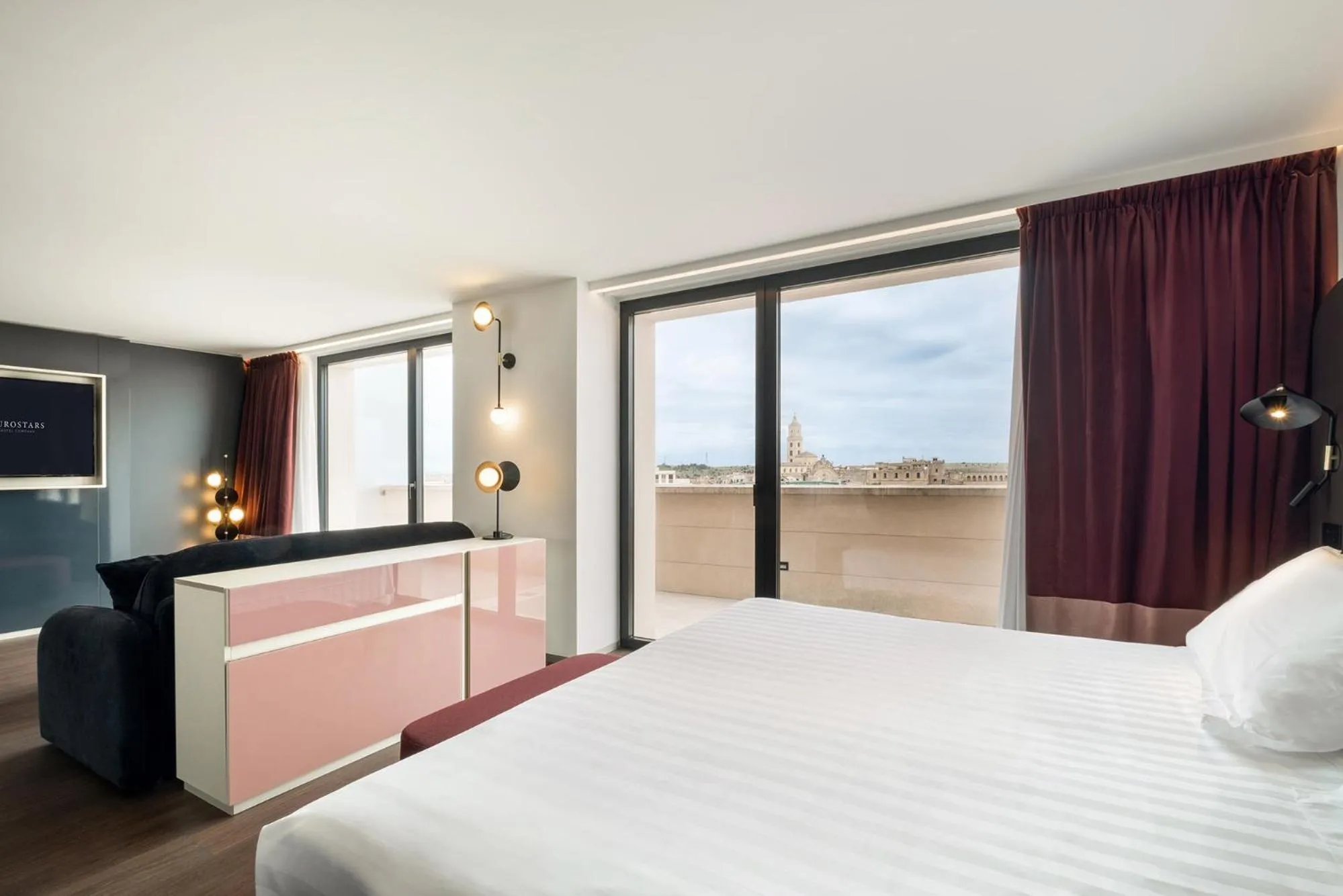 Bed in Eurostars Matera La Suite