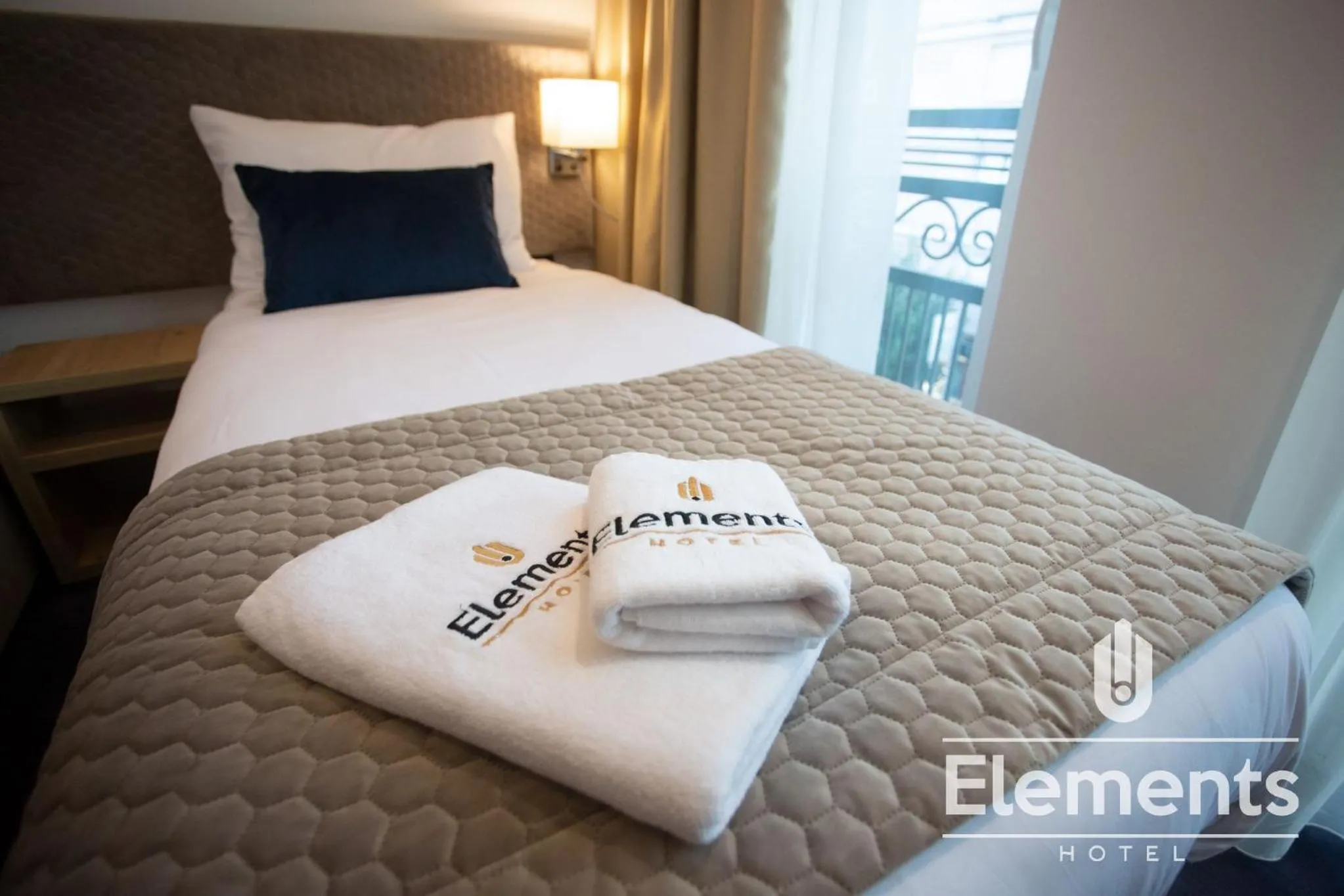 Bed in Hotel Elements